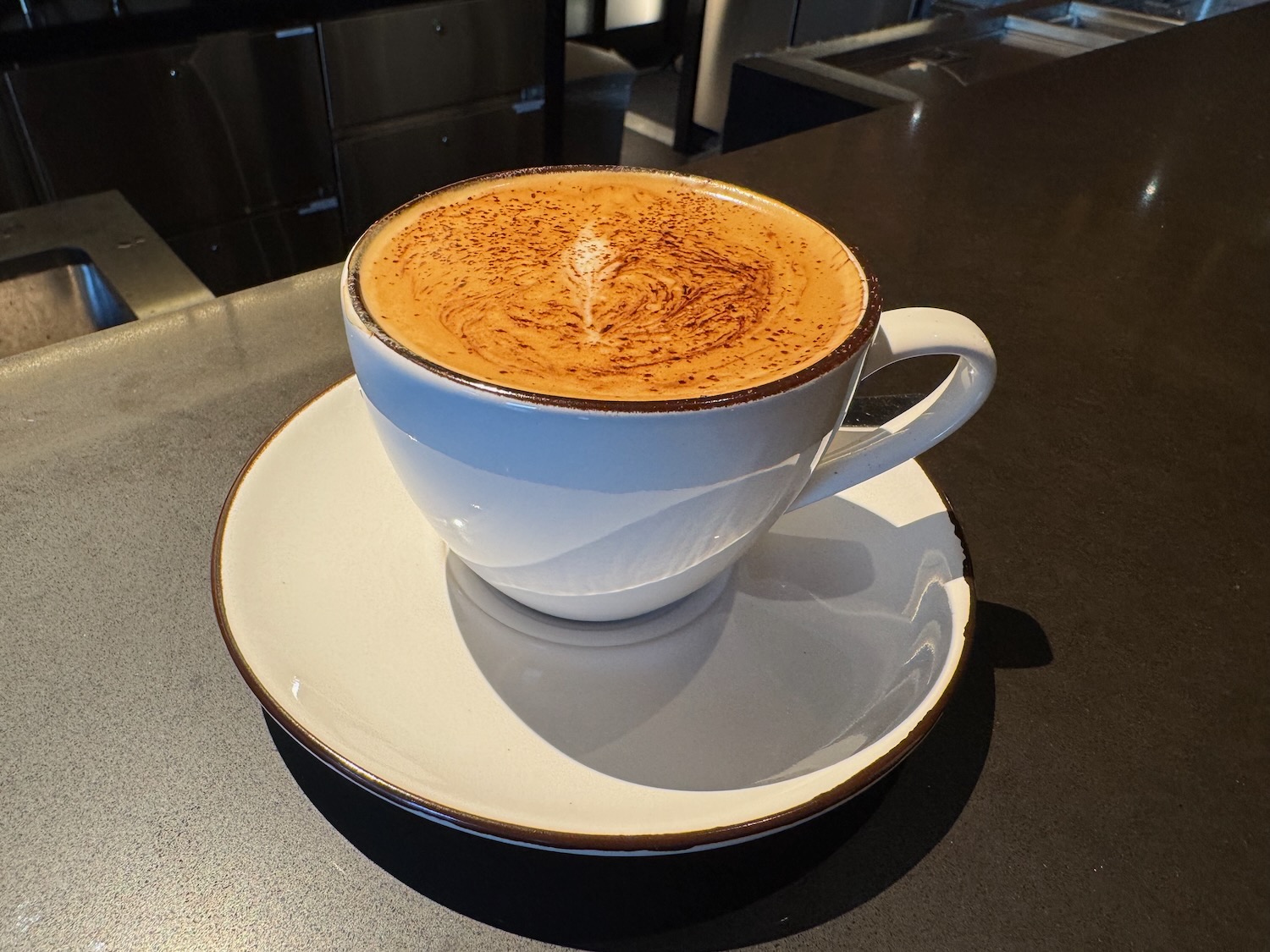 a cup of coffee on a saucer