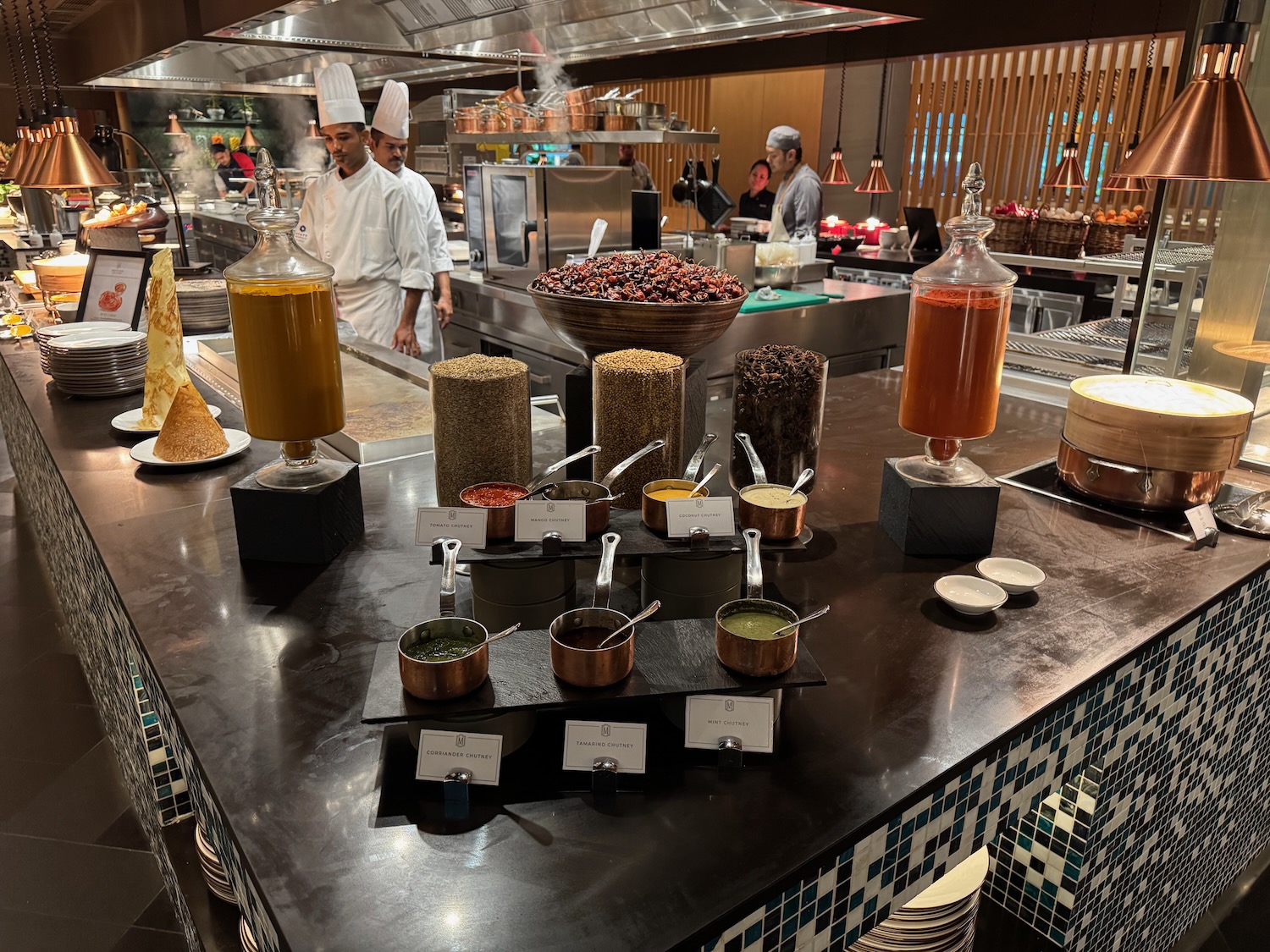 a kitchen with many different kinds of food