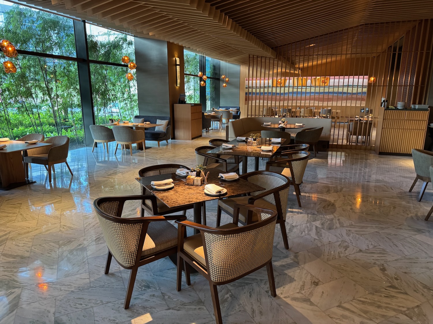 a restaurant with tables and chairs