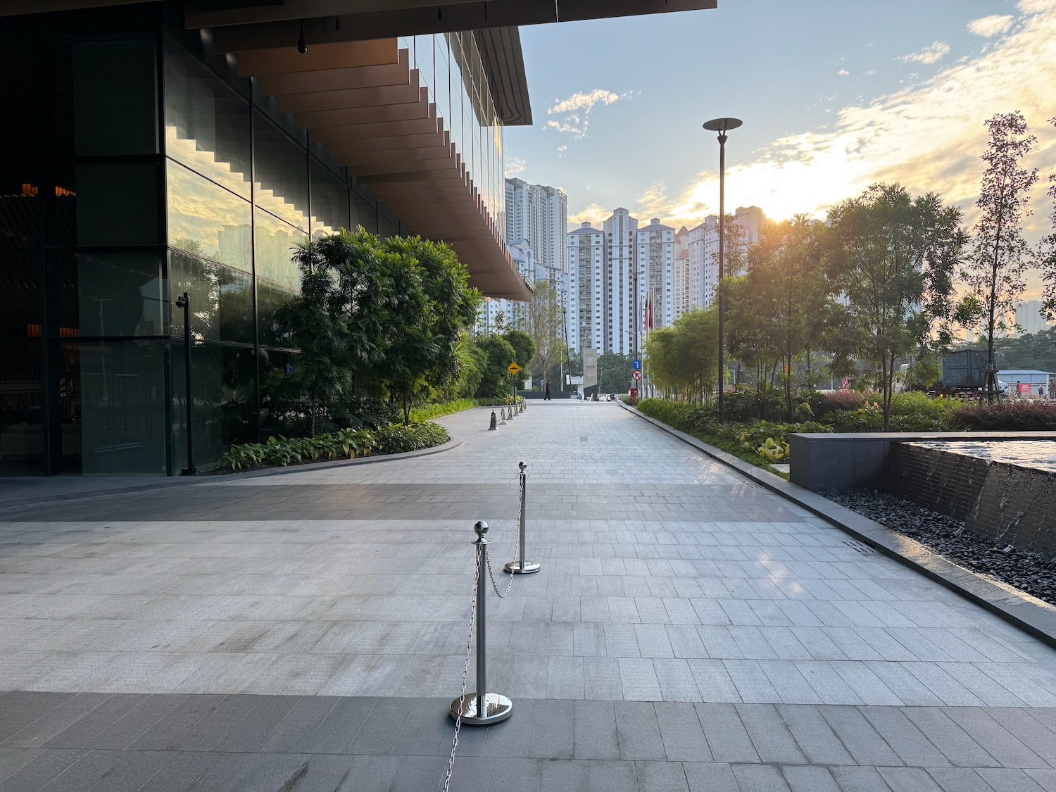 a walkway with a building in the background