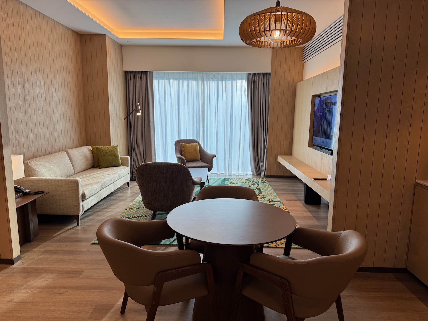 a room with a table and chairs