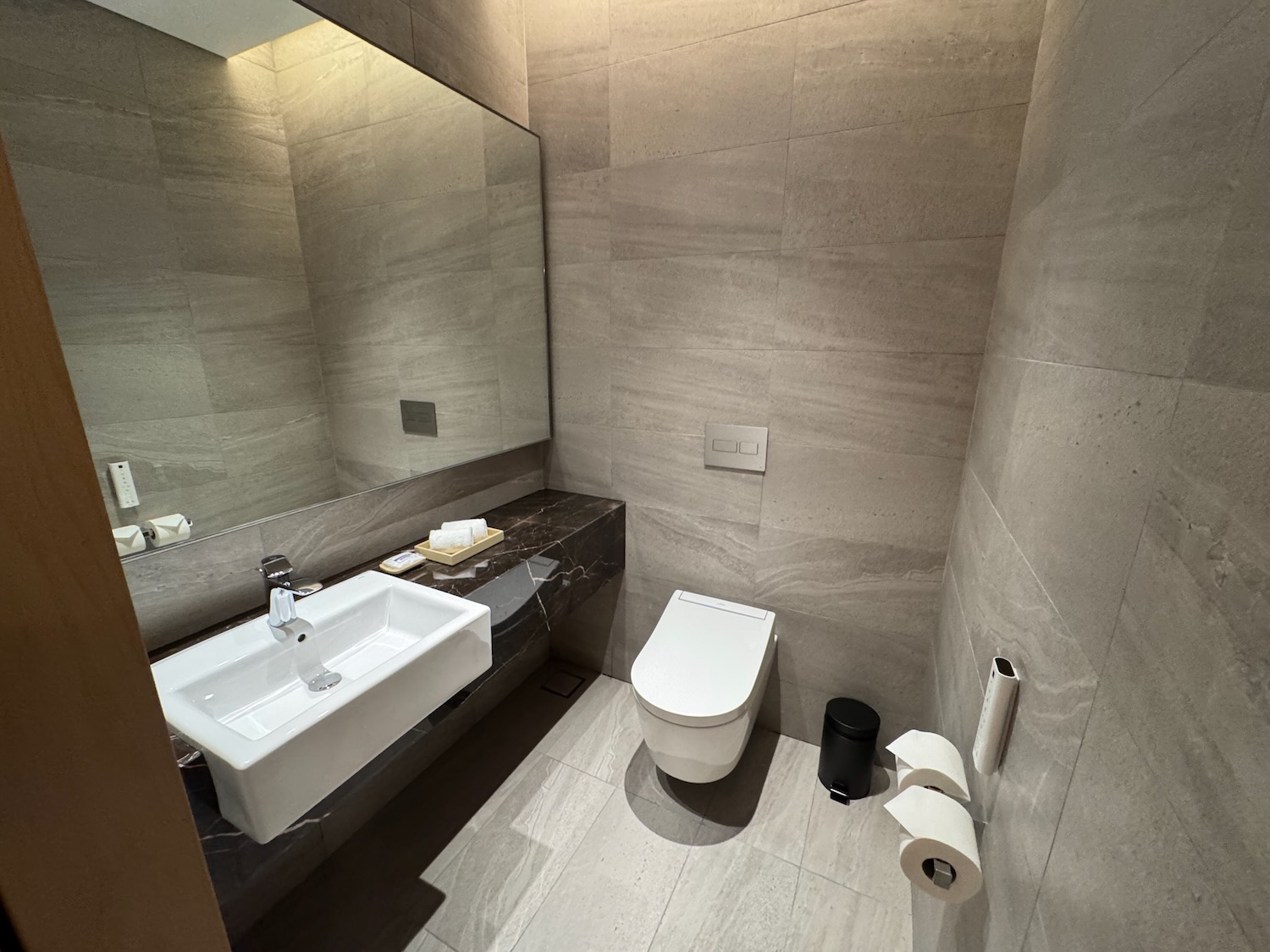 a bathroom with a sink and toilet