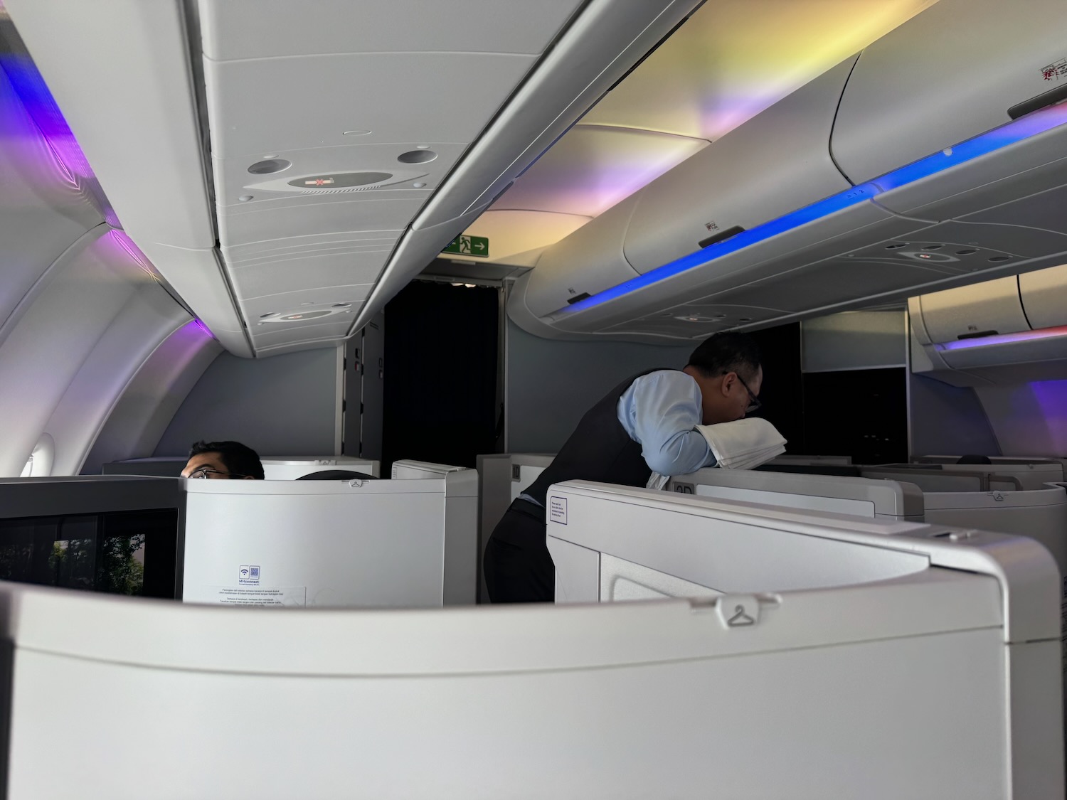 a man leaning on a desk