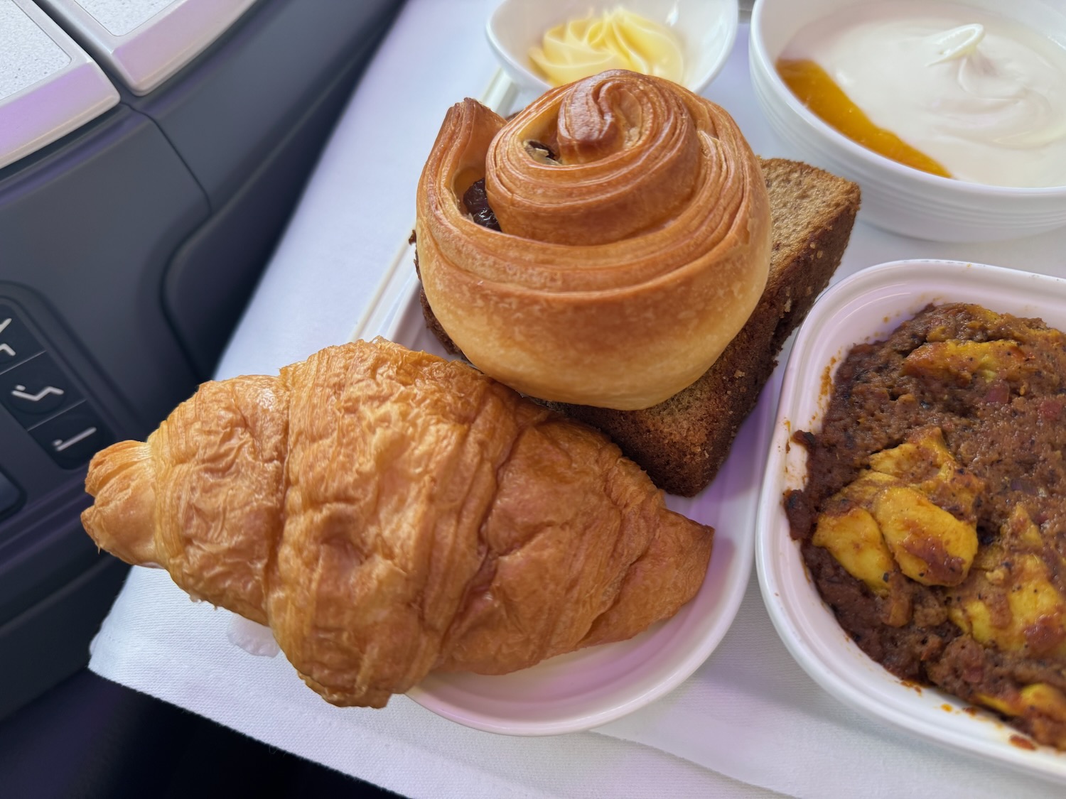 a plate of food on a tray
