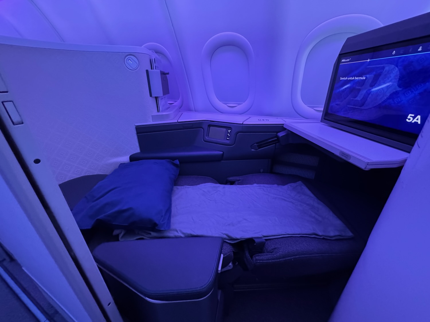 a bed in a plane