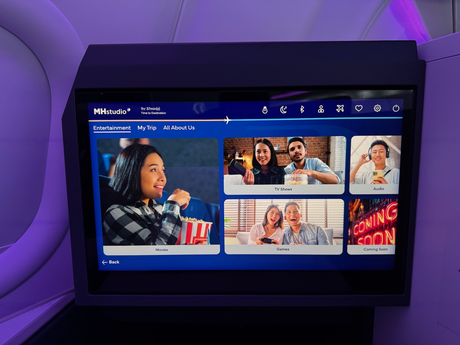 a screen with a group of people on it