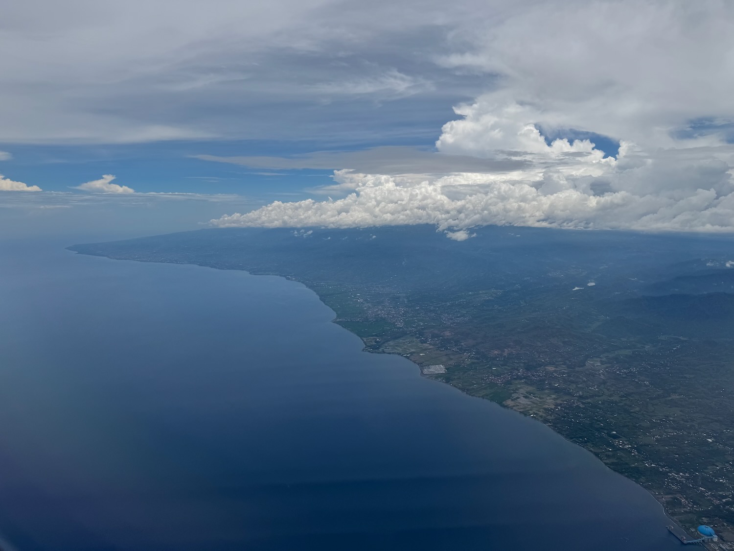 a aerial view of a body of water and land