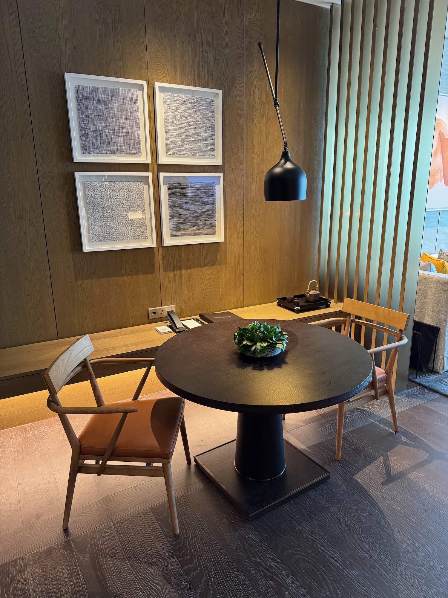 a table with chairs in a room