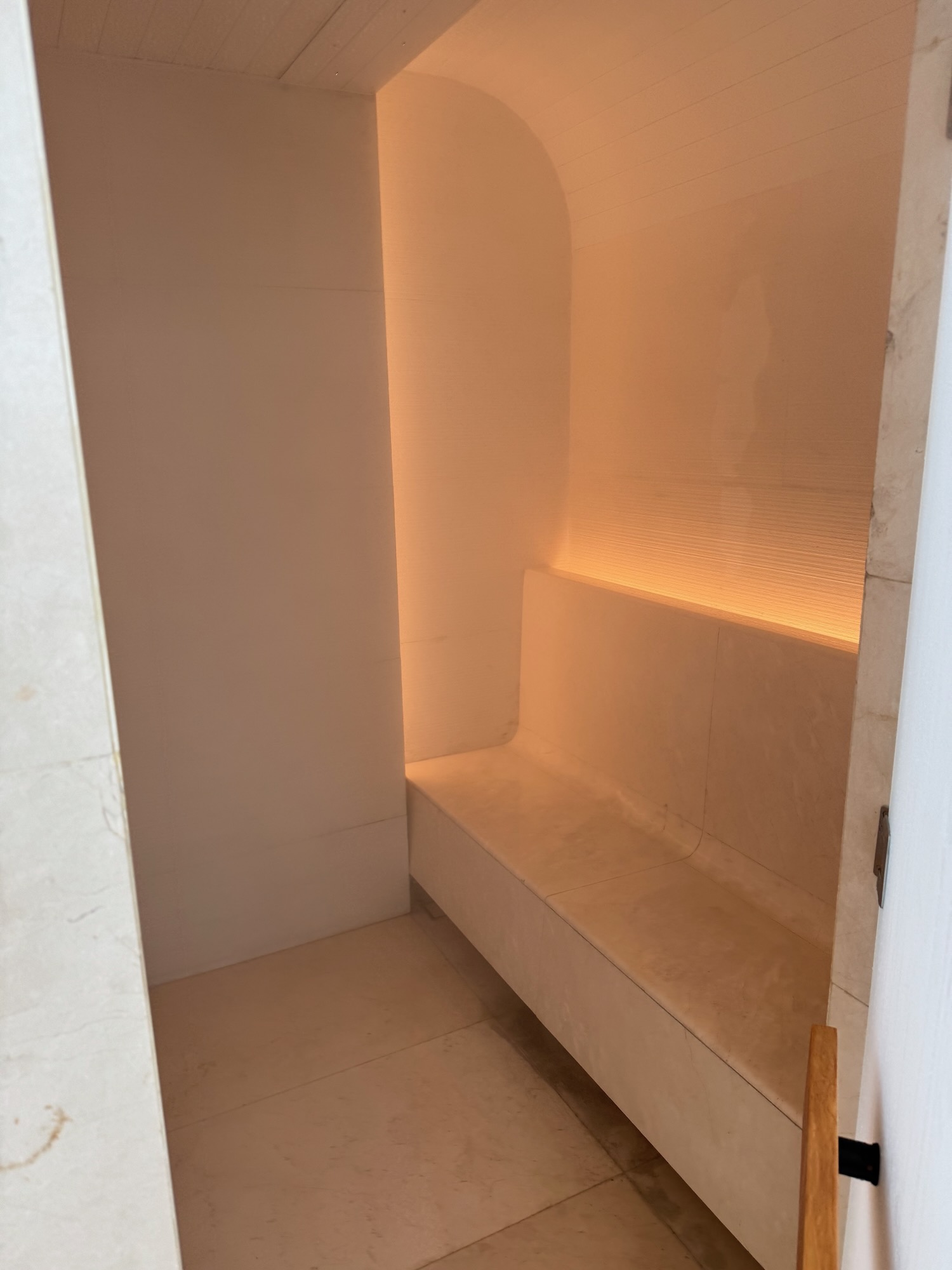 a white bench in a room