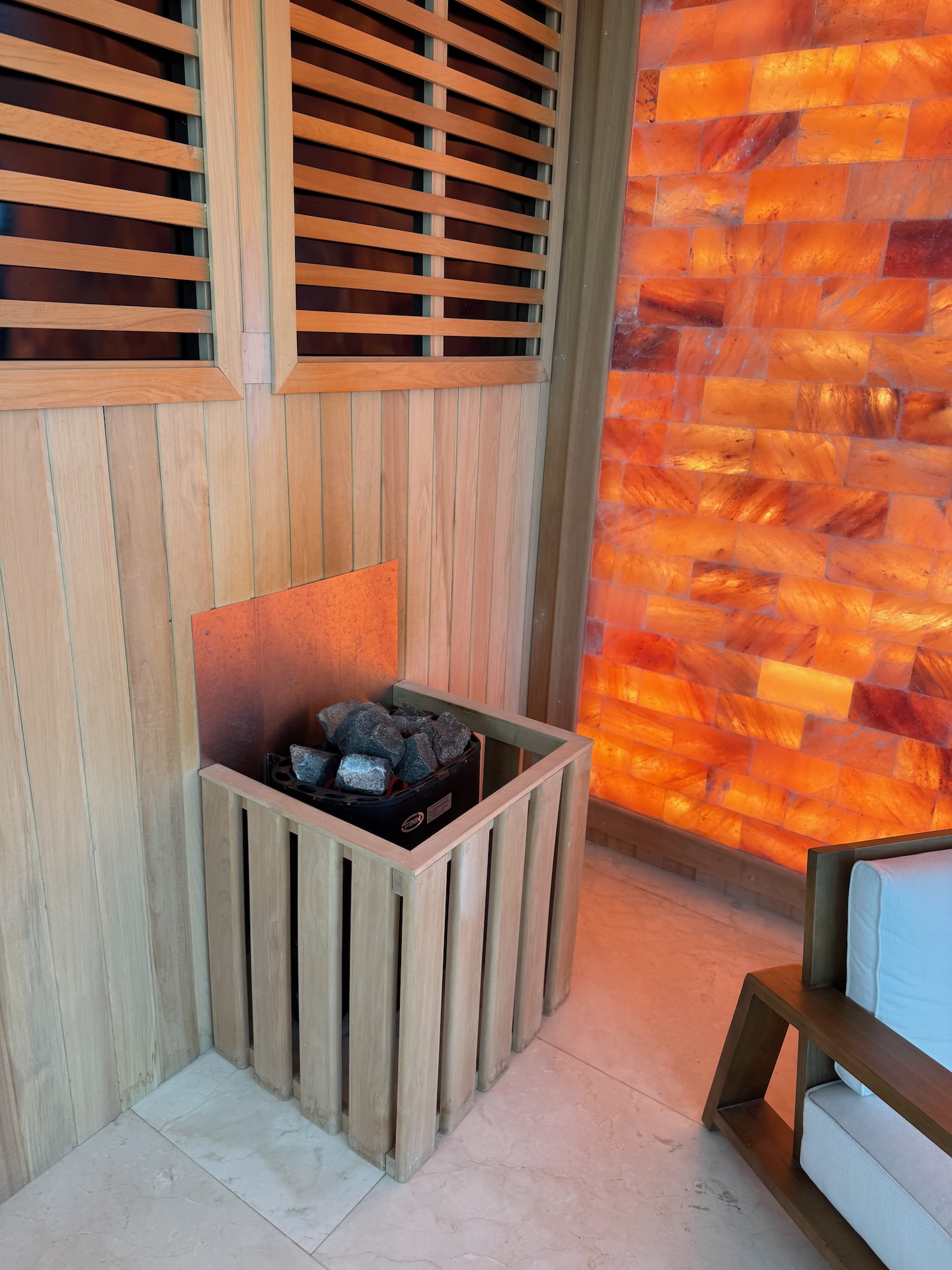 a room with a wood box and a wall of salt