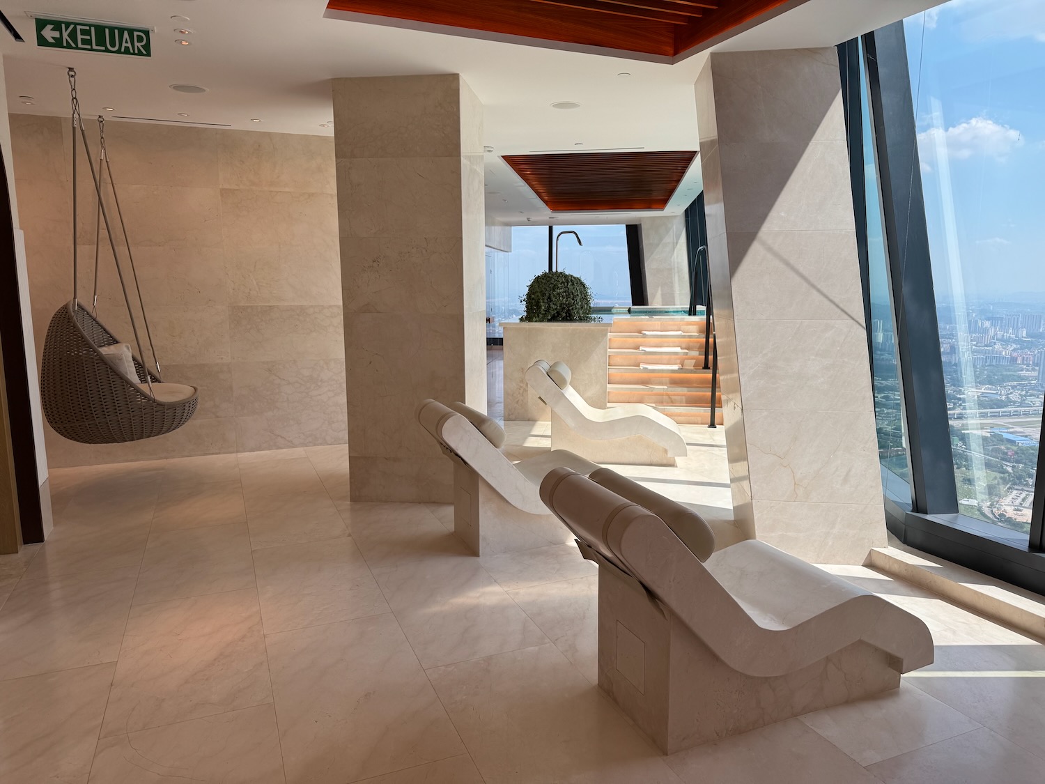 a room with a swing and a hammock