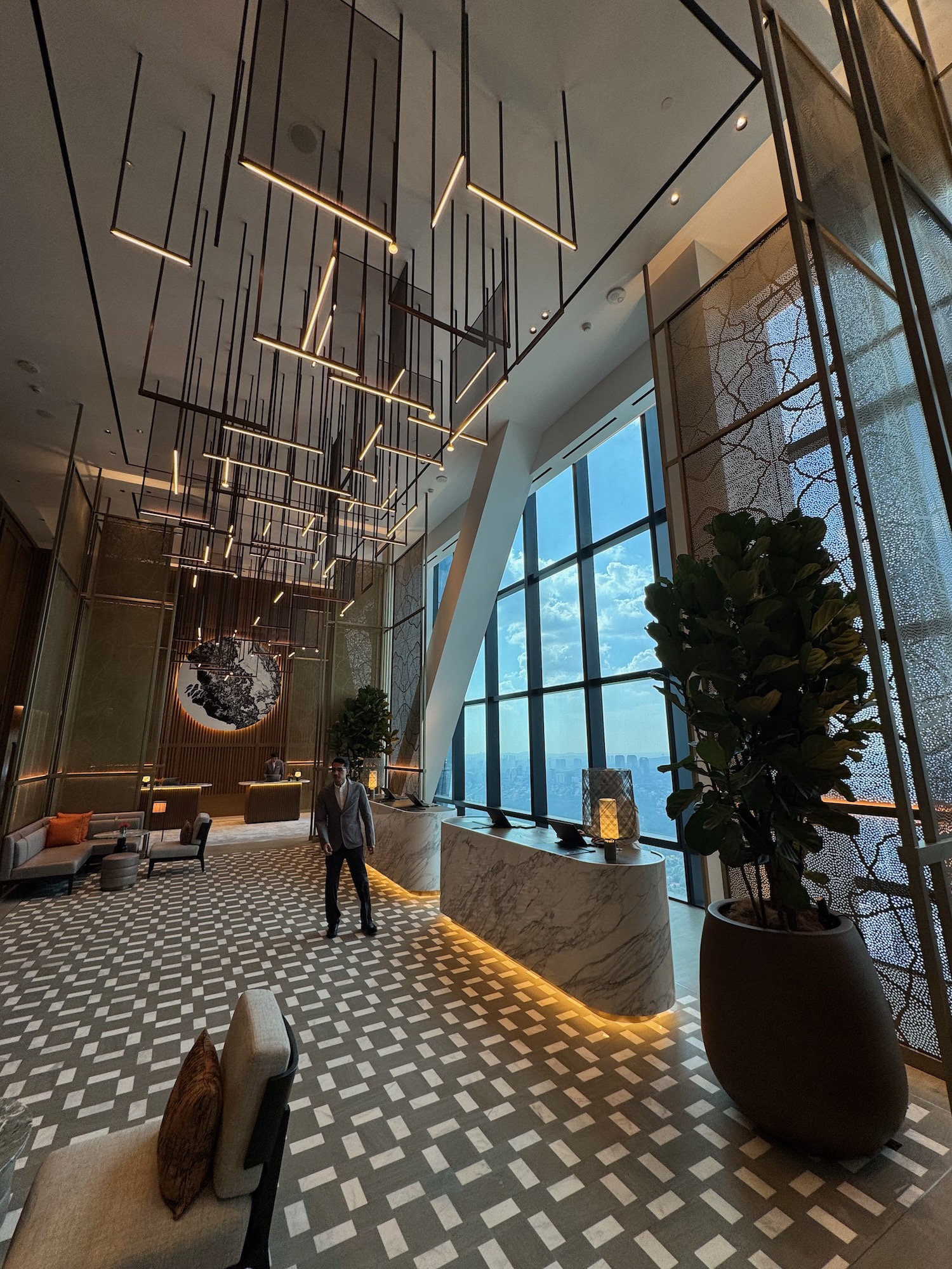 a man standing in a lobby