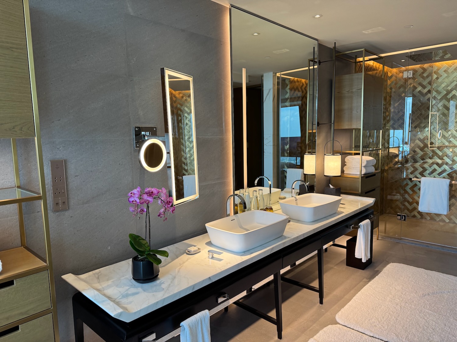 a bathroom with sinks and mirrors