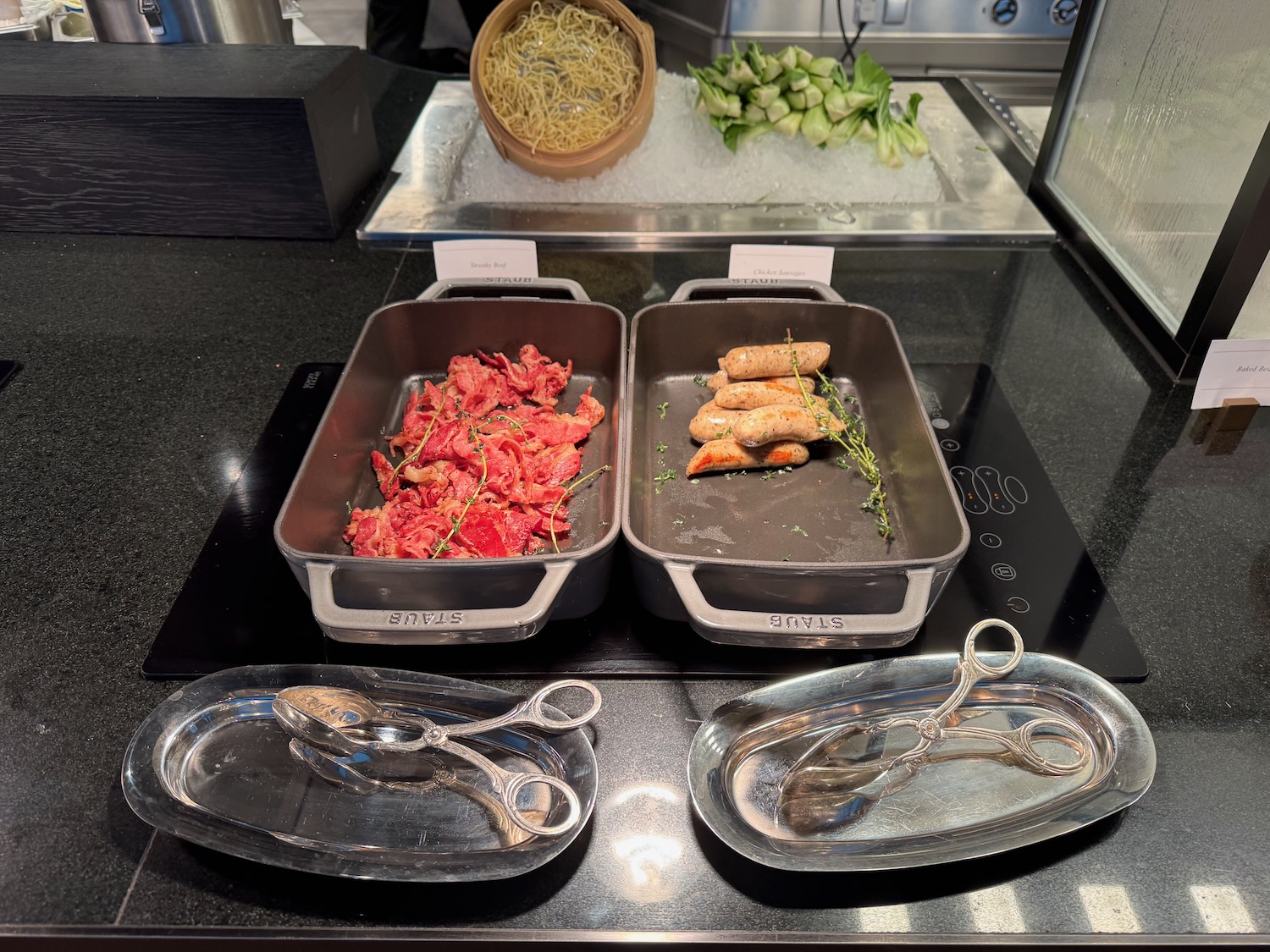 a group of pans with food in them