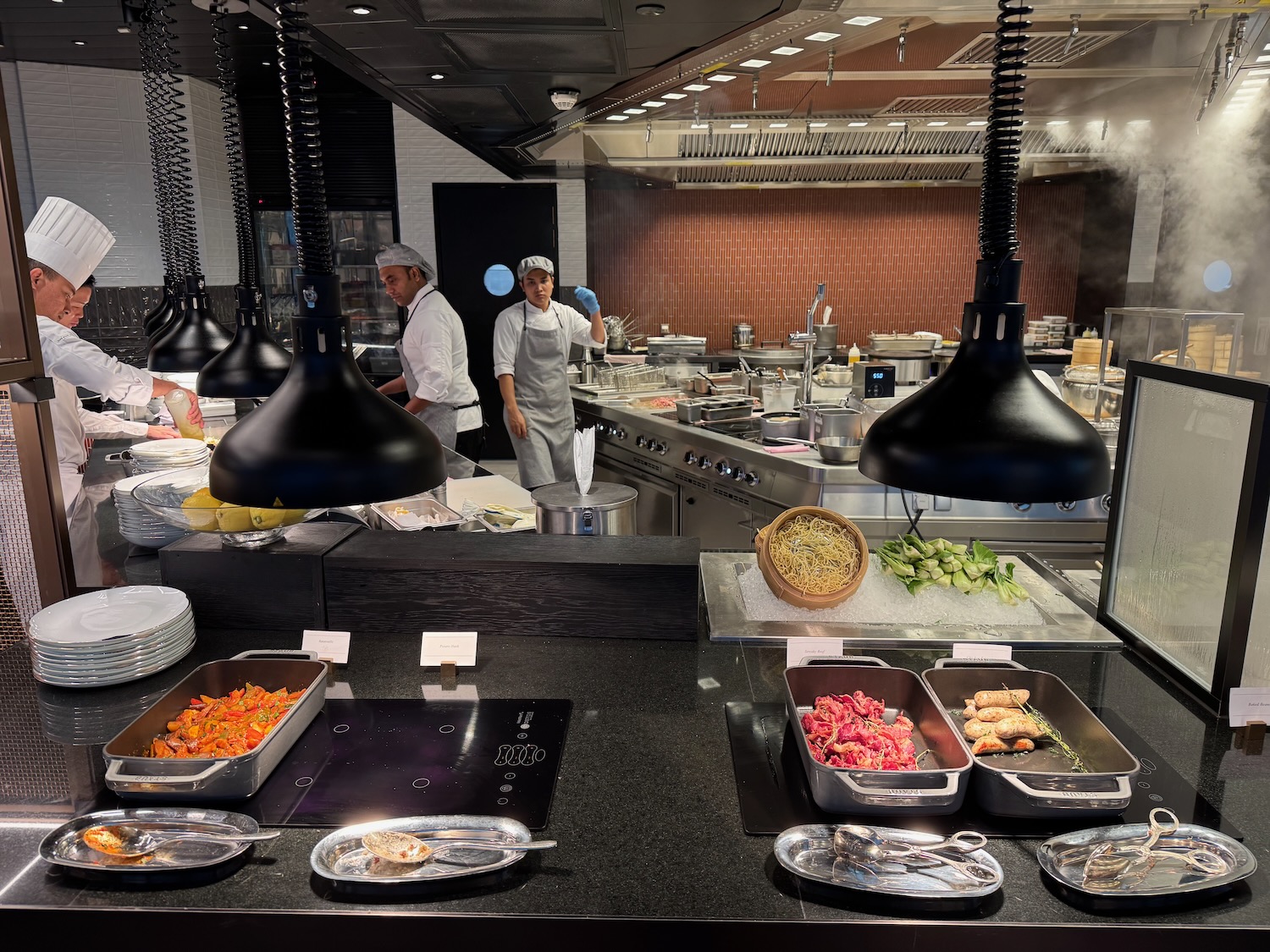 a group of chefs in a kitchen
