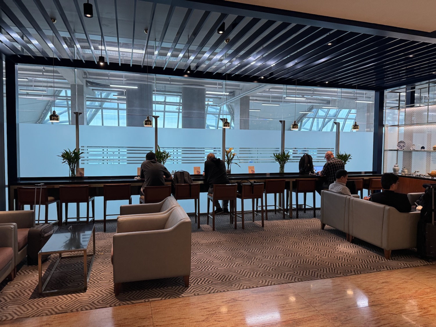 a group of people sitting at a desk