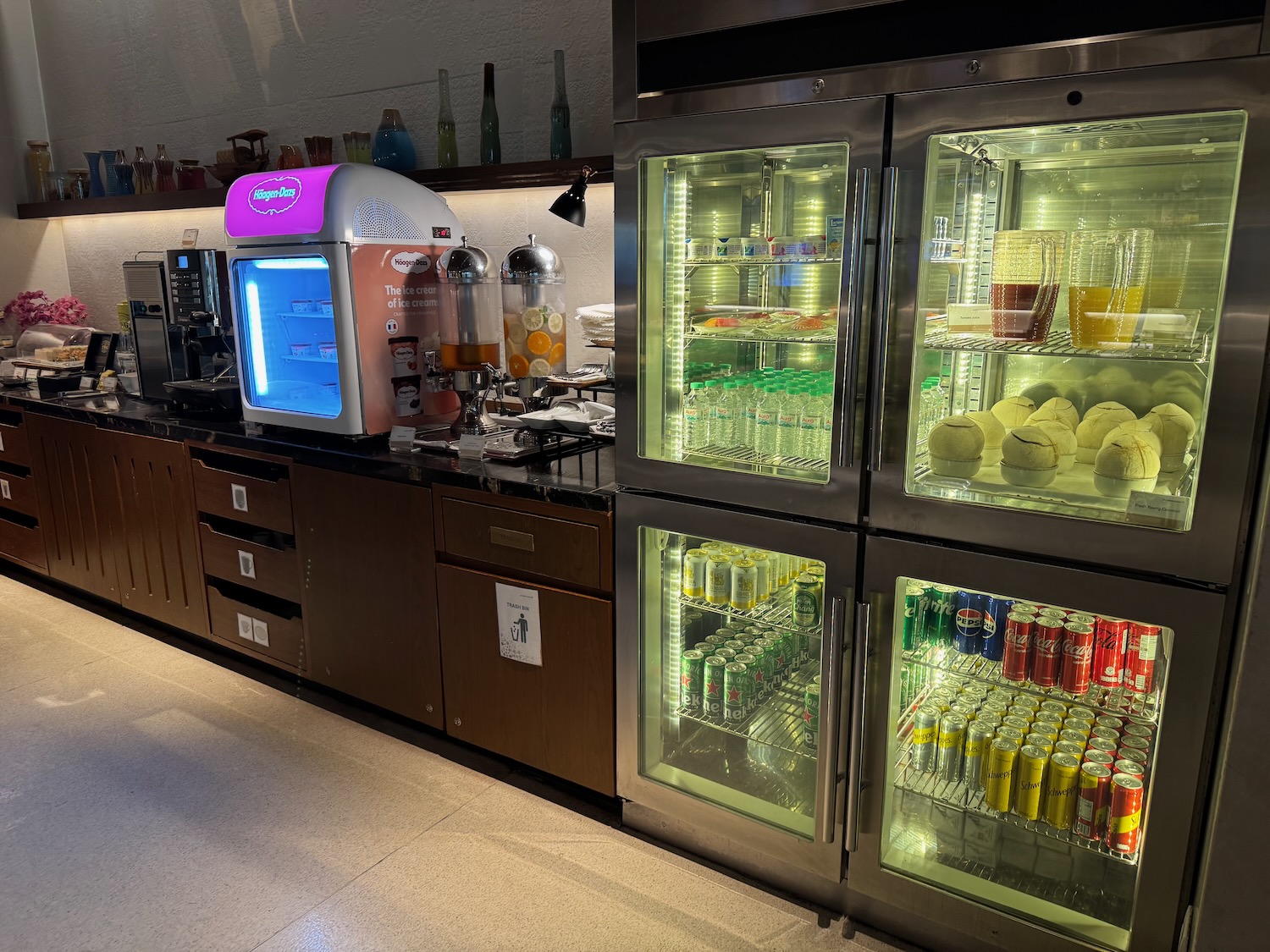 a refrigerator with drinks and beverages in it