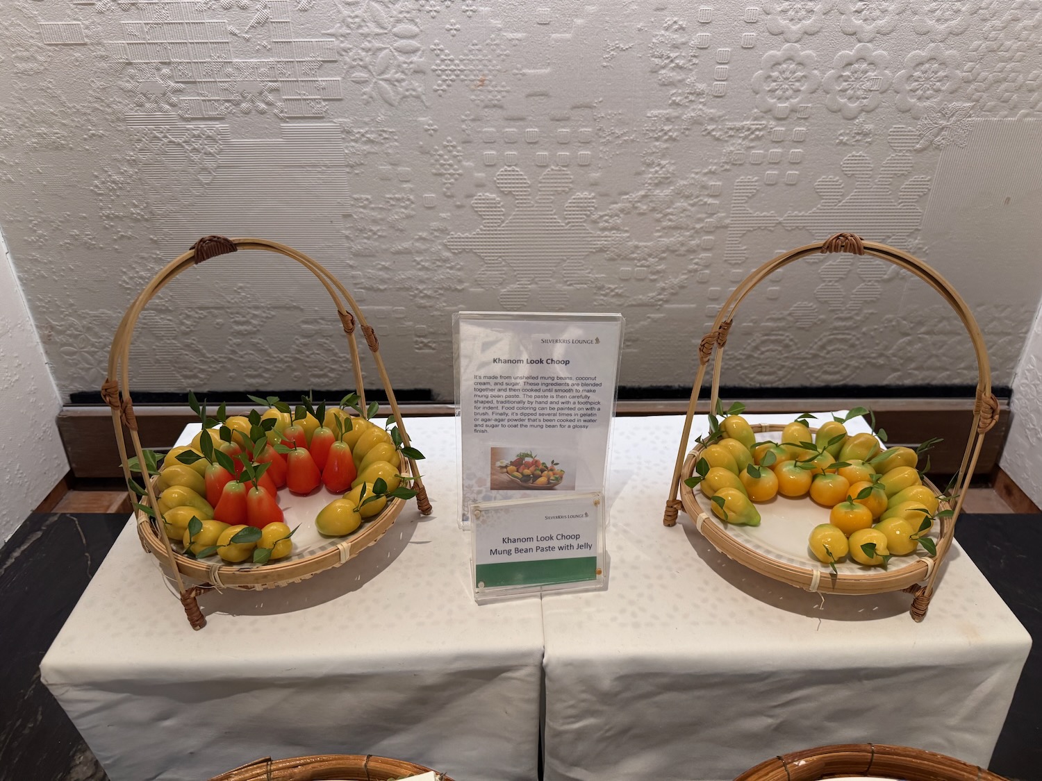 a group of baskets with fruit on them