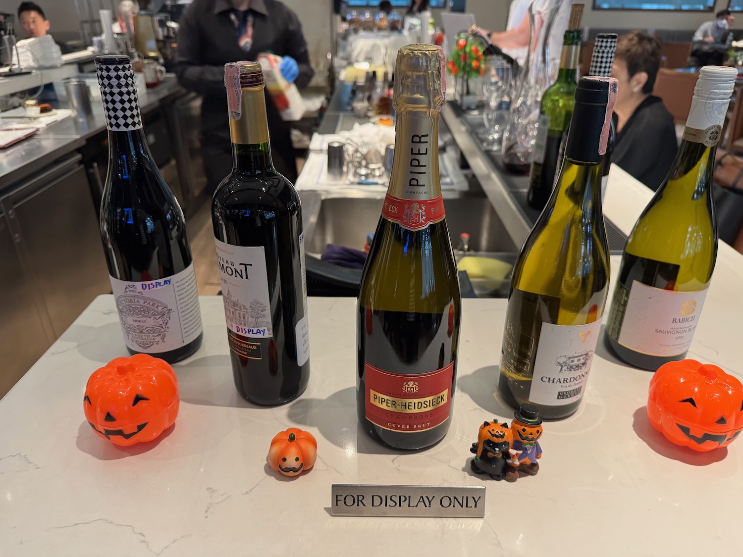 a group of bottles of wine on a table