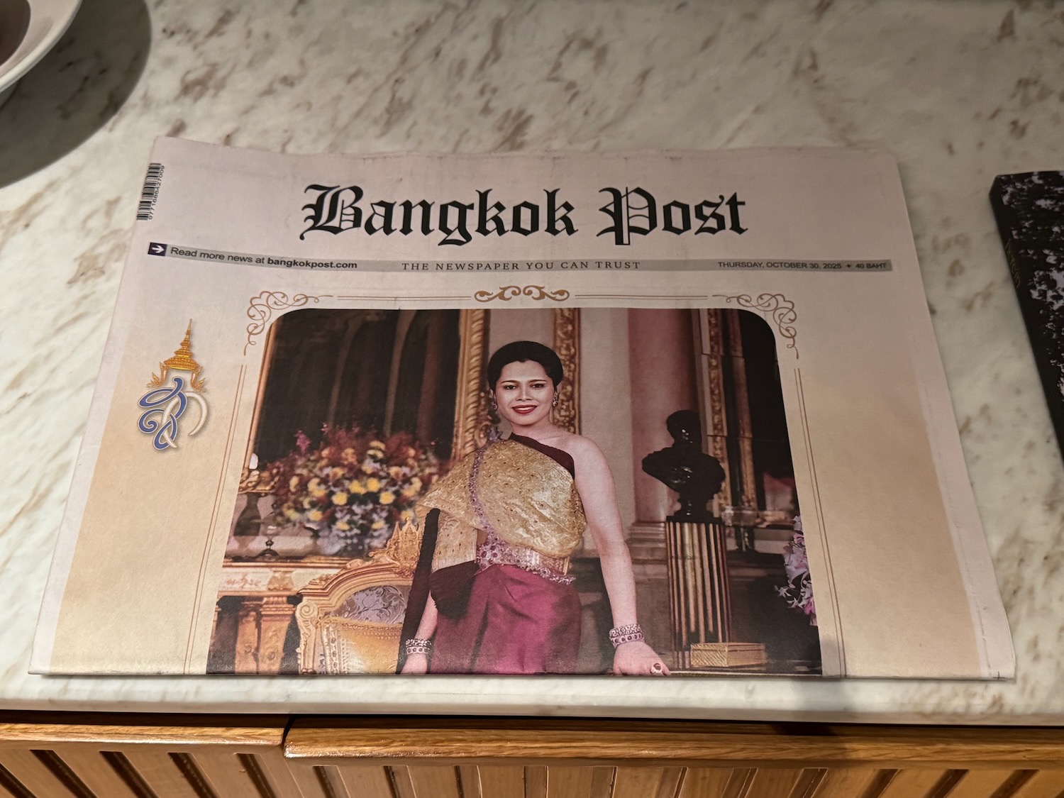 a newspaper with a picture of a woman on it