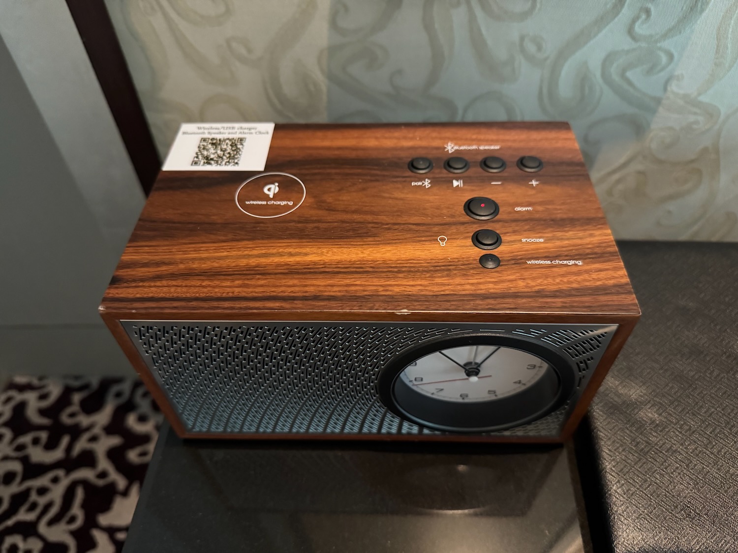 a wooden box with a clock on it