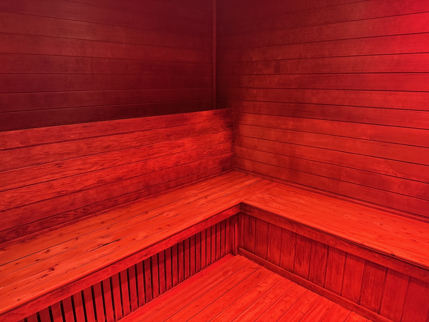a wooden bench in a room