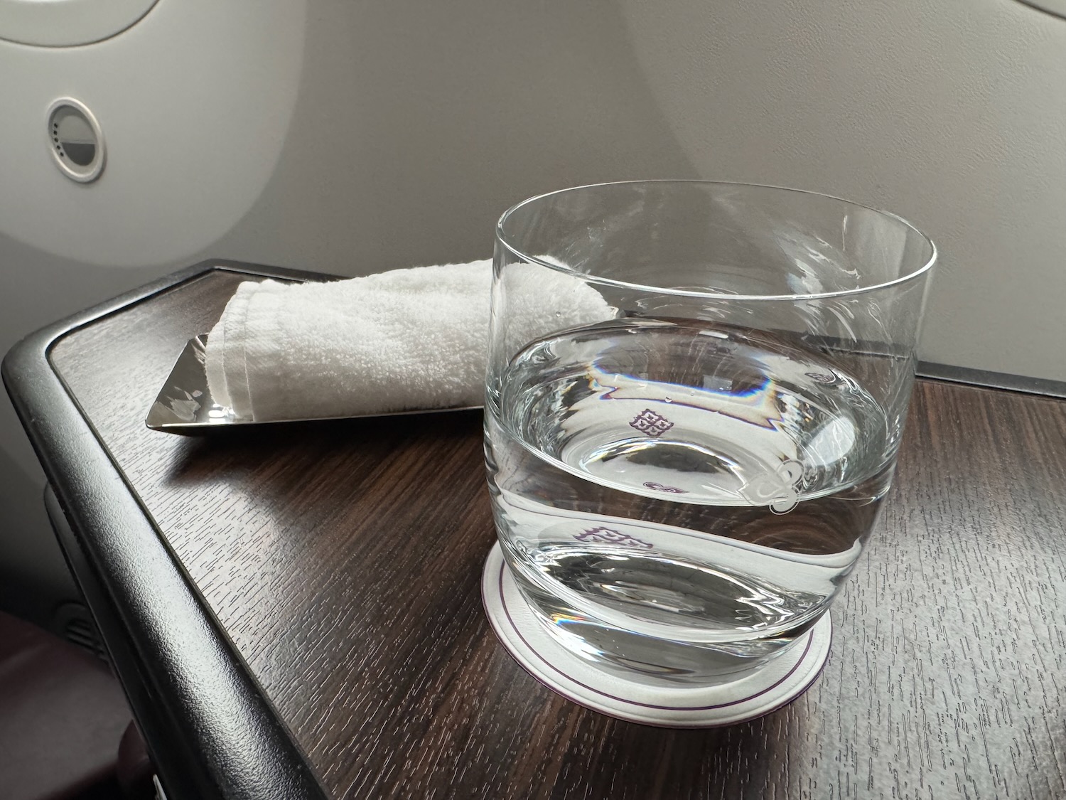 a glass of water on a table