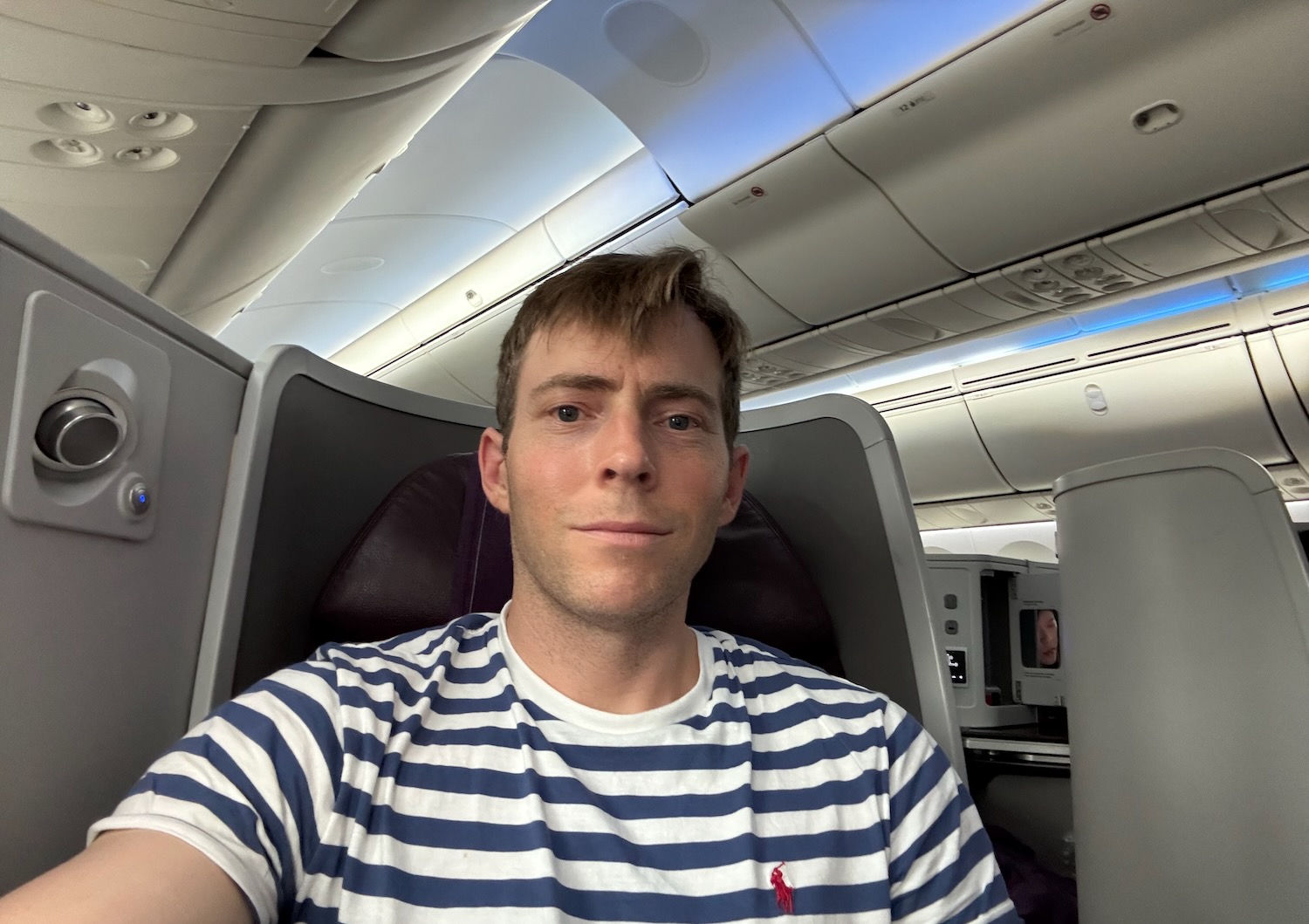 a man sitting in an airplane