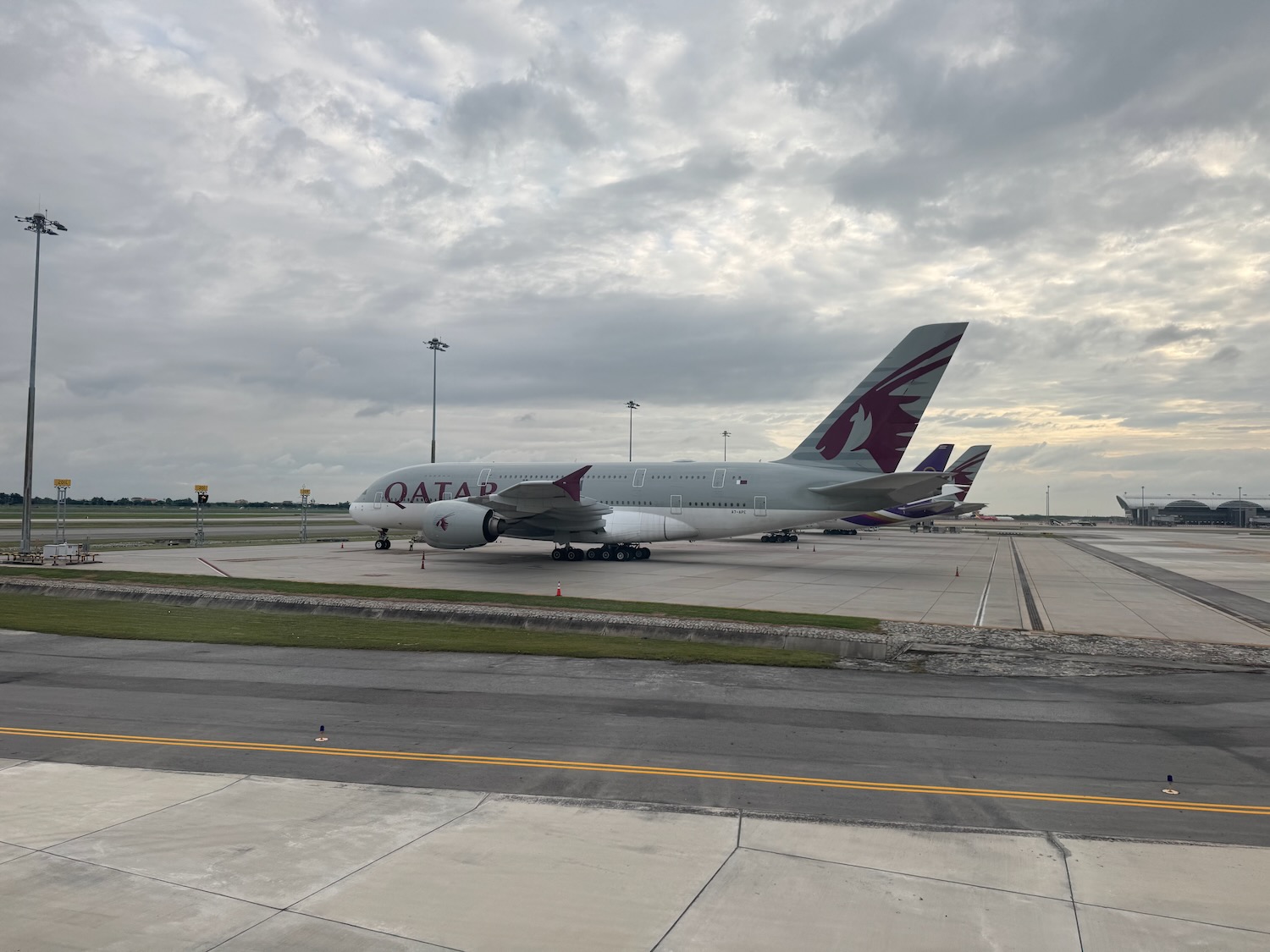 a group of airplanes on a runway