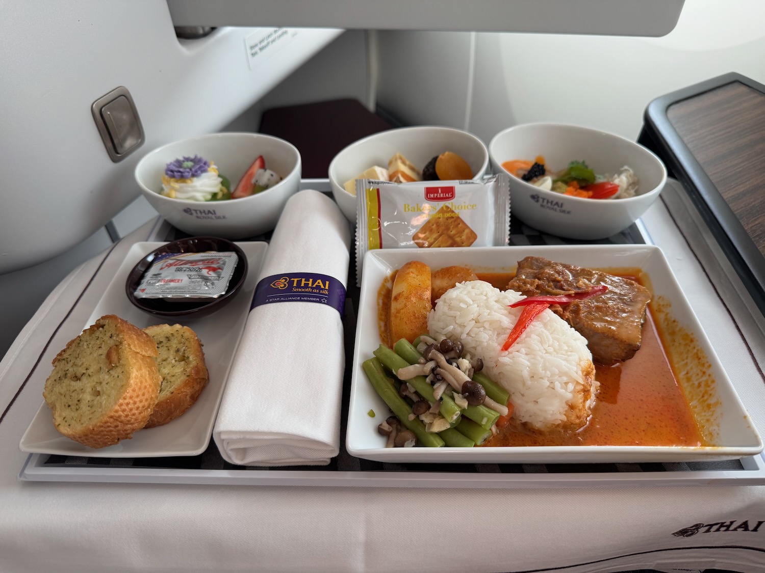 a tray of food on a plane
