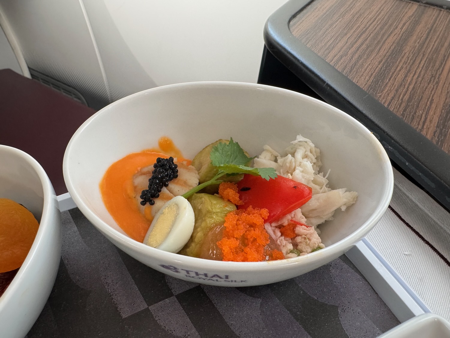 a bowl of food on a tray