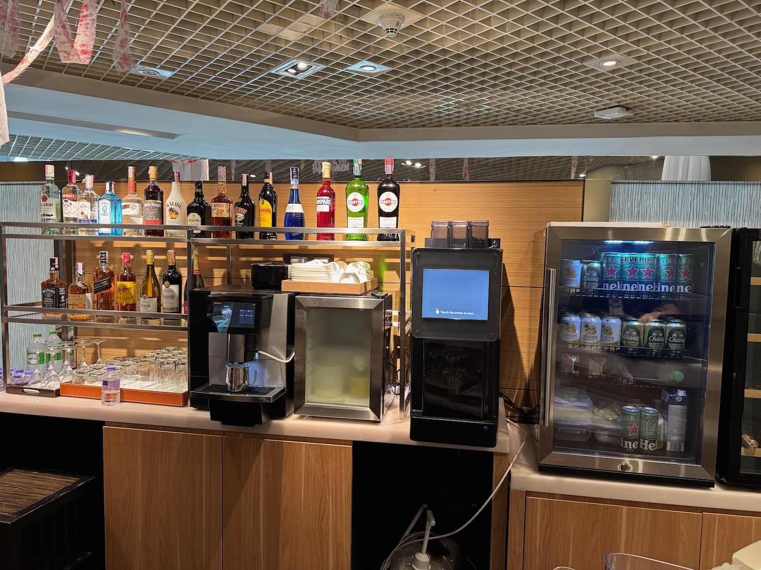 a bar with drinks and beverages