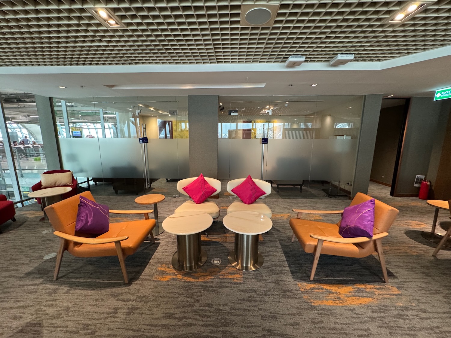 a room with chairs and tables