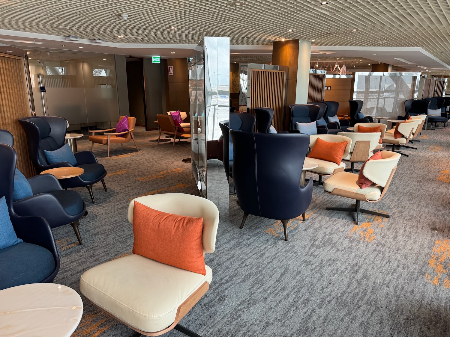 a room with chairs and a wall