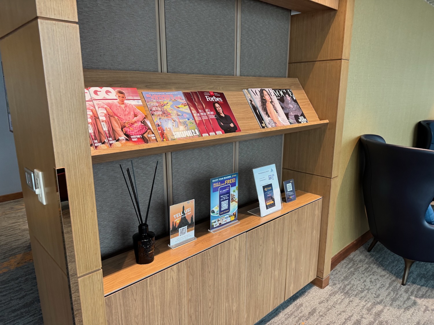 a shelf with magazines on it