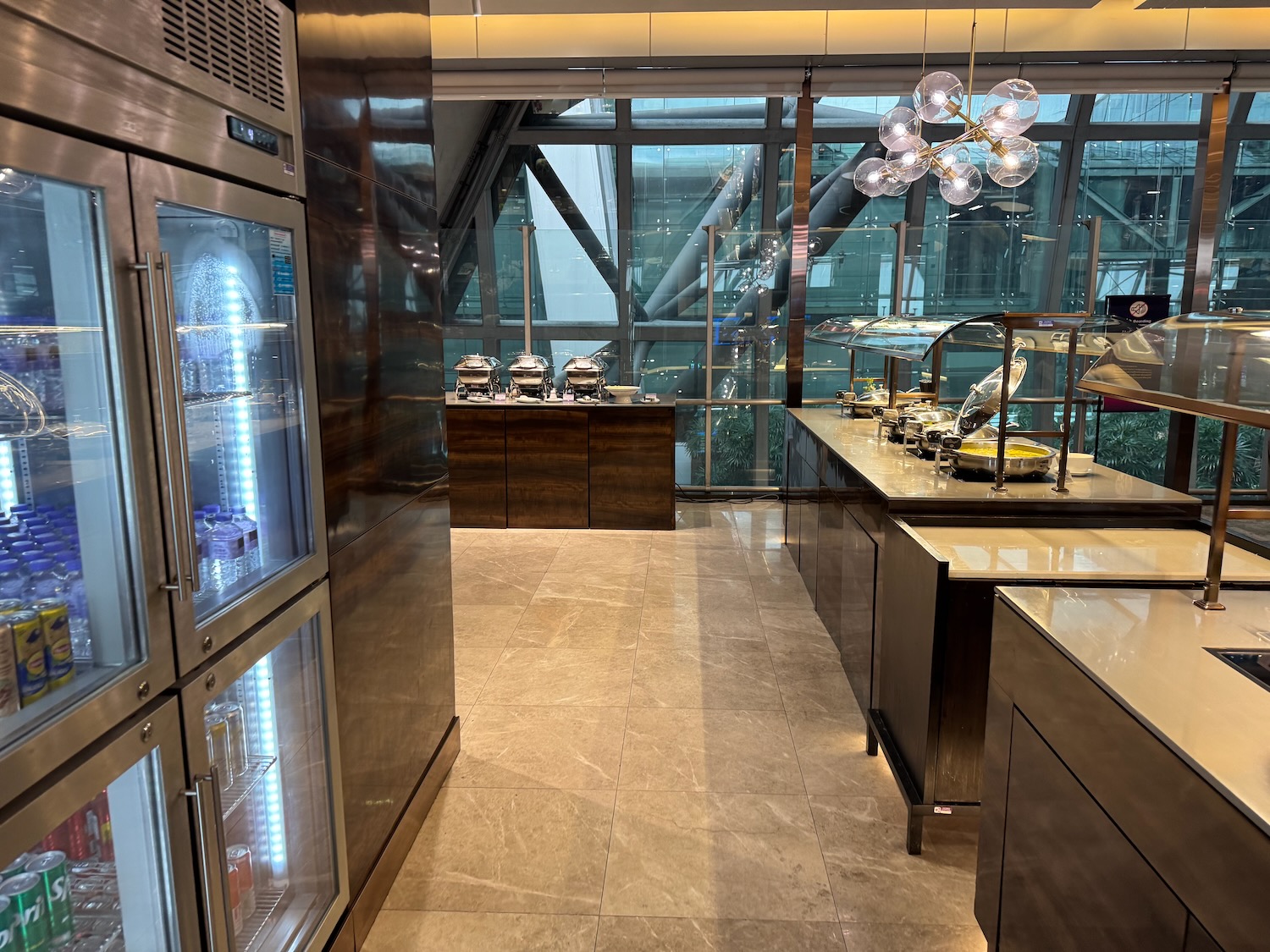 a kitchen with a large glass door