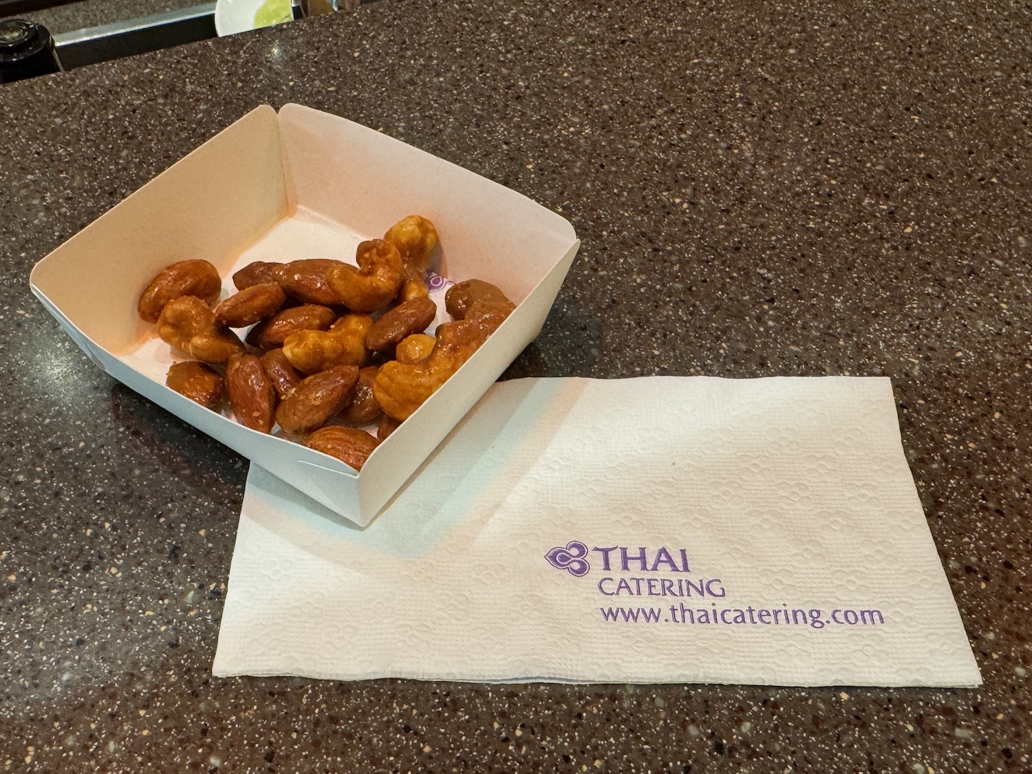 a box of nuts on a napkin