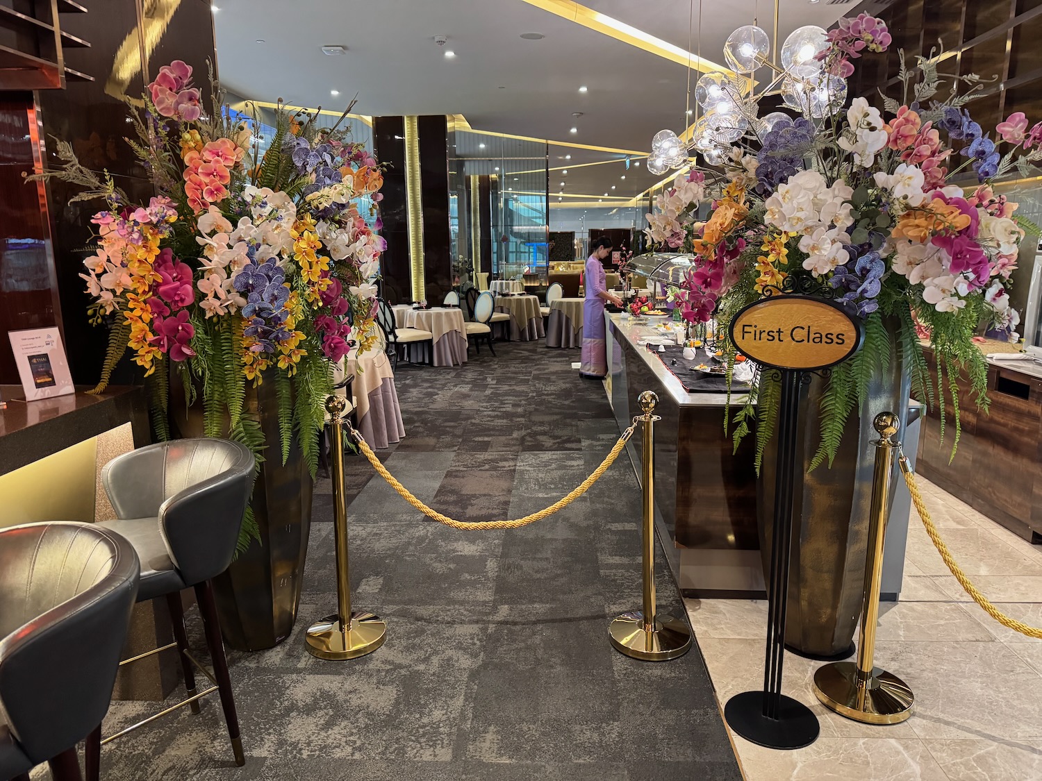 a roped up to a bar with flowers