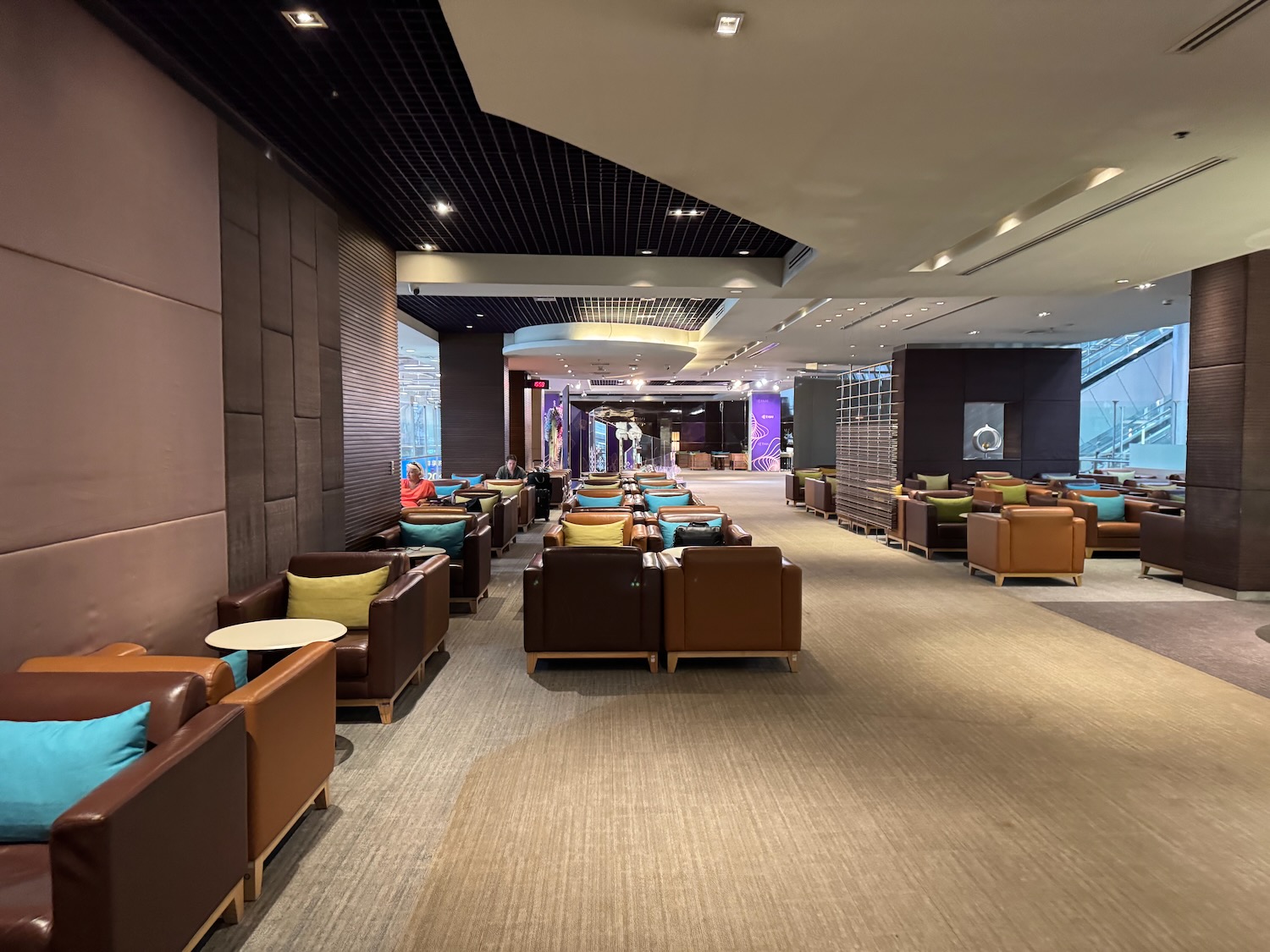 a room with many chairs and tables