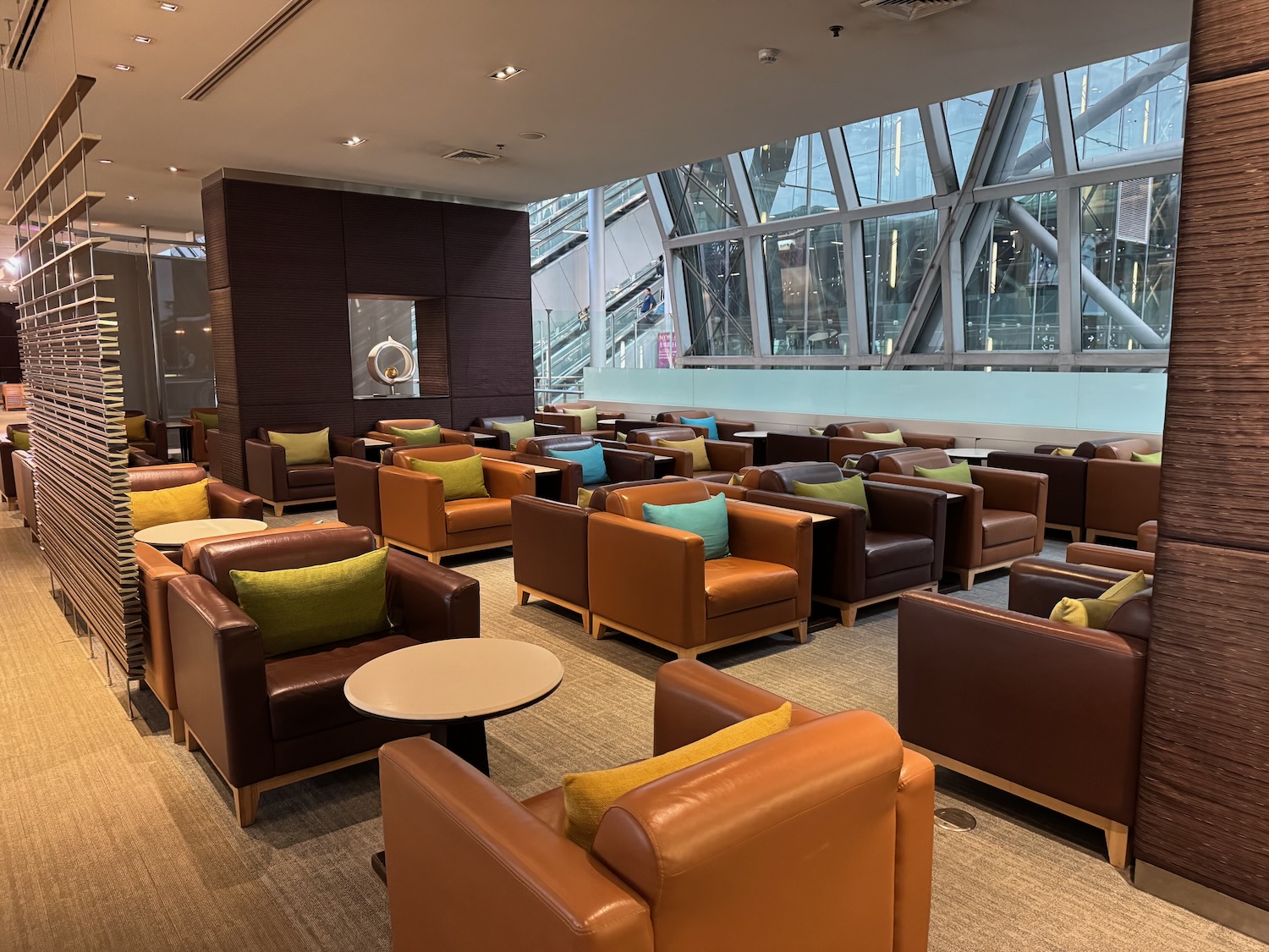 a room with many chairs and tables