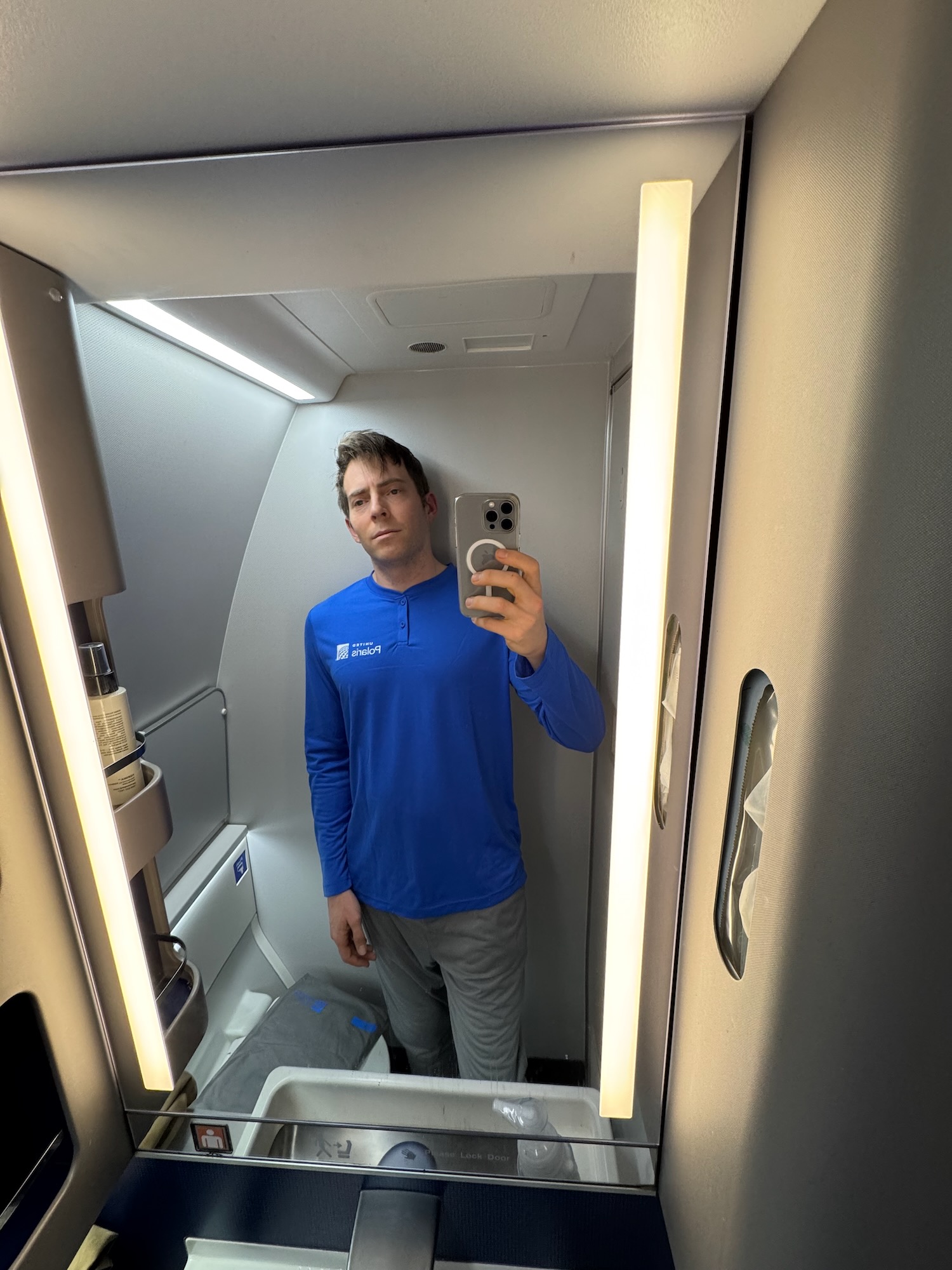 a man taking a selfie in a mirror