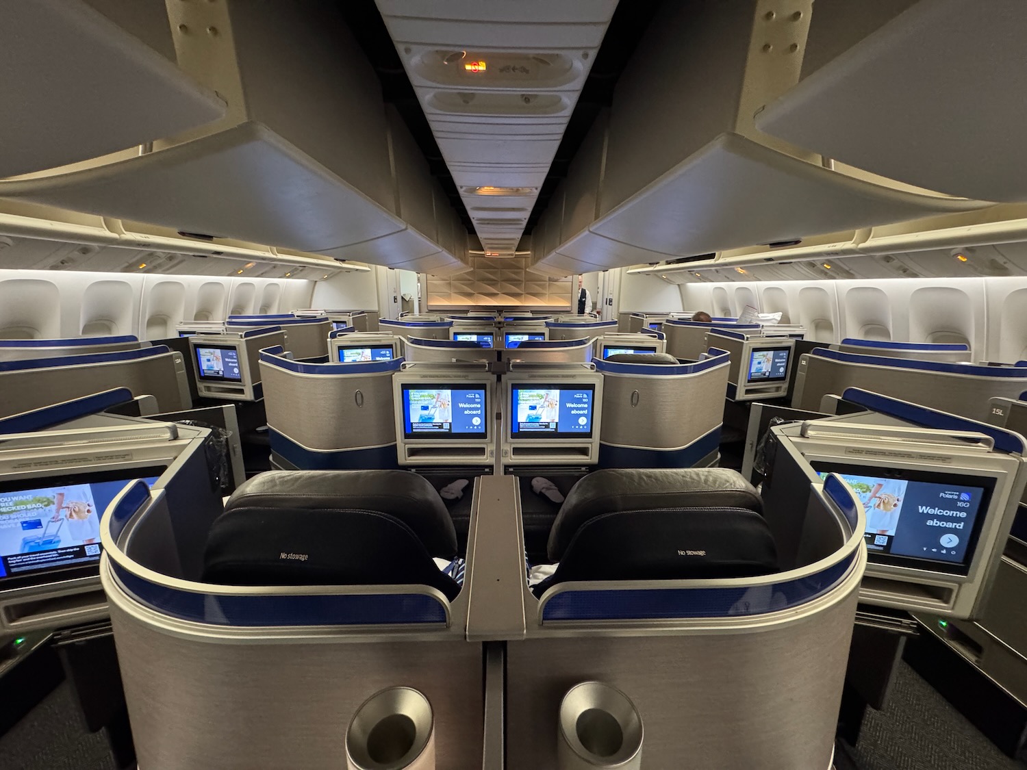 an airplane with a row of monitors