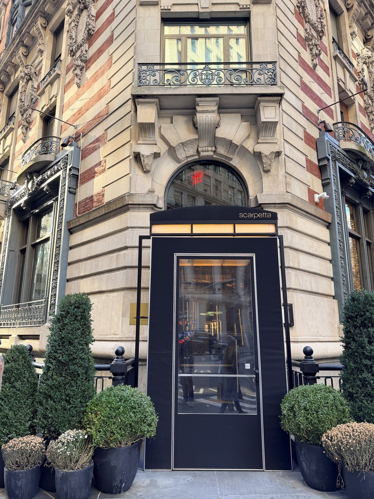 a building with a black awning