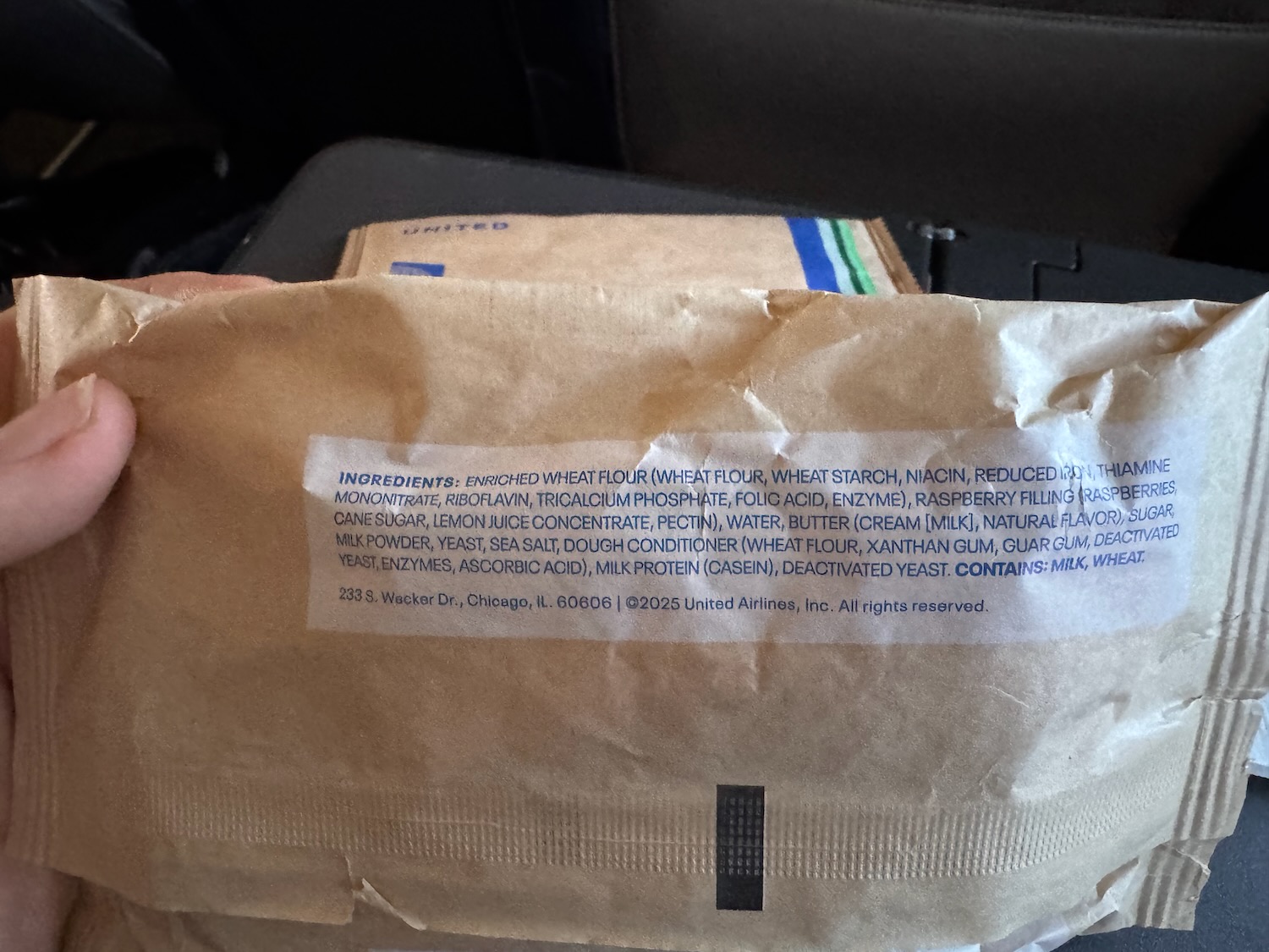 a brown envelope with blue text