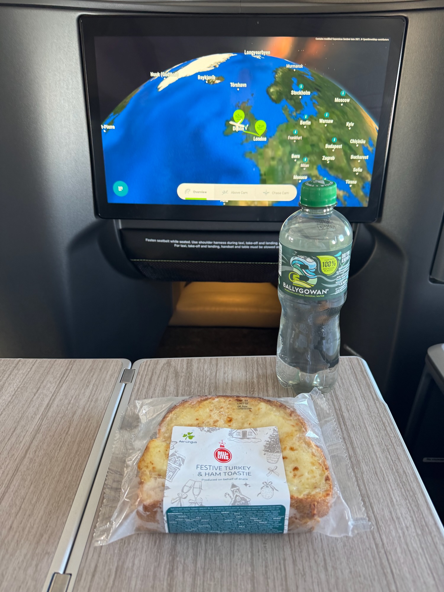 a food and a bottle of water on a table