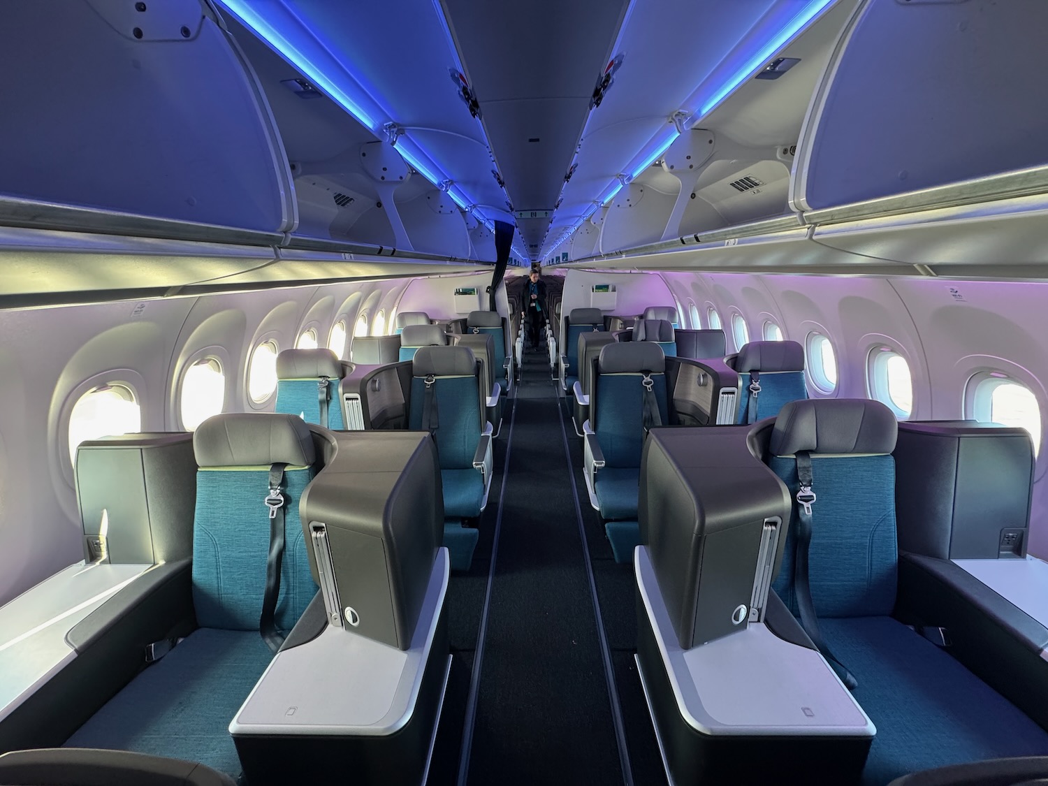 inside an airplane with blue lights