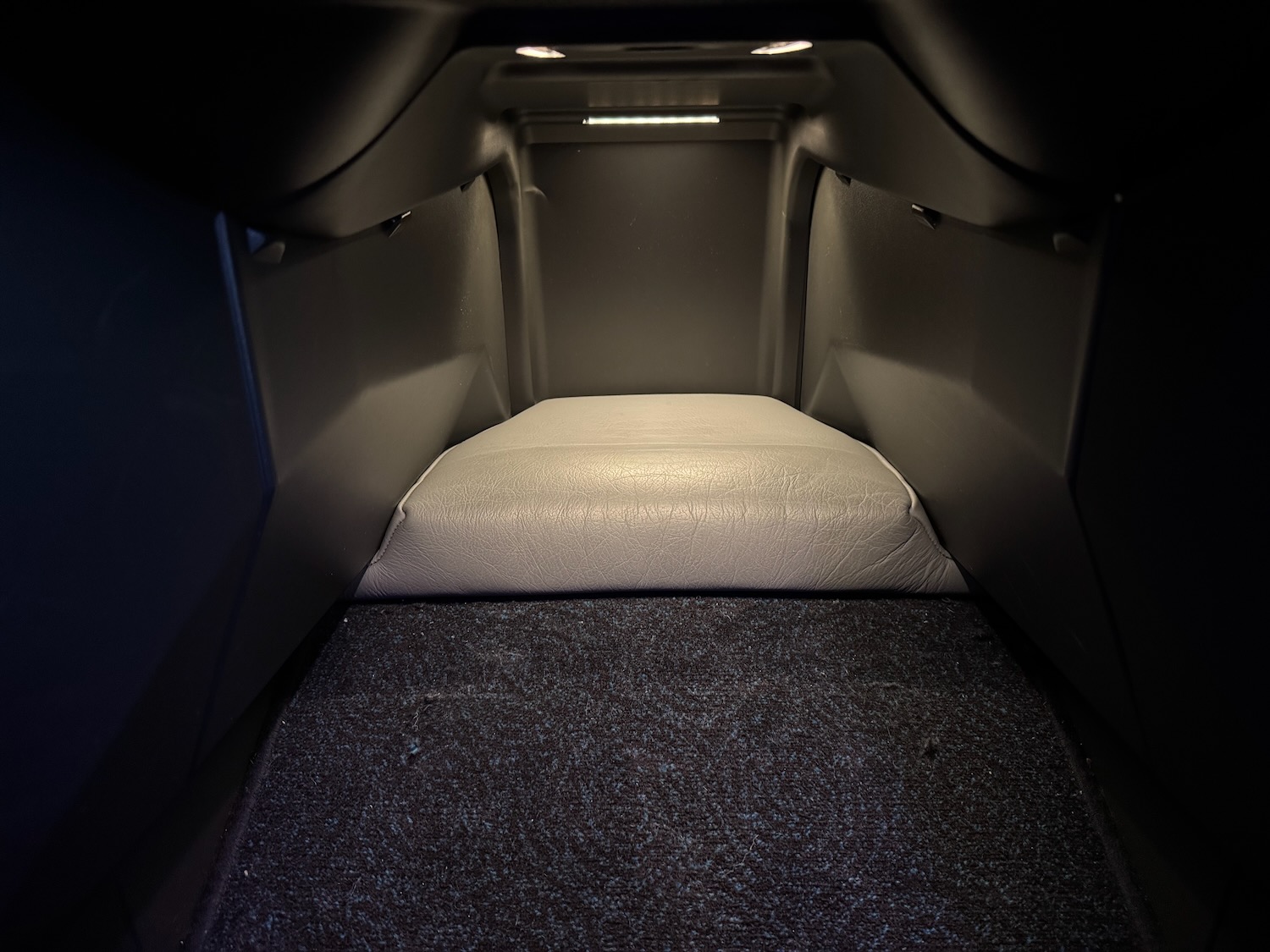 a seat in a dark room