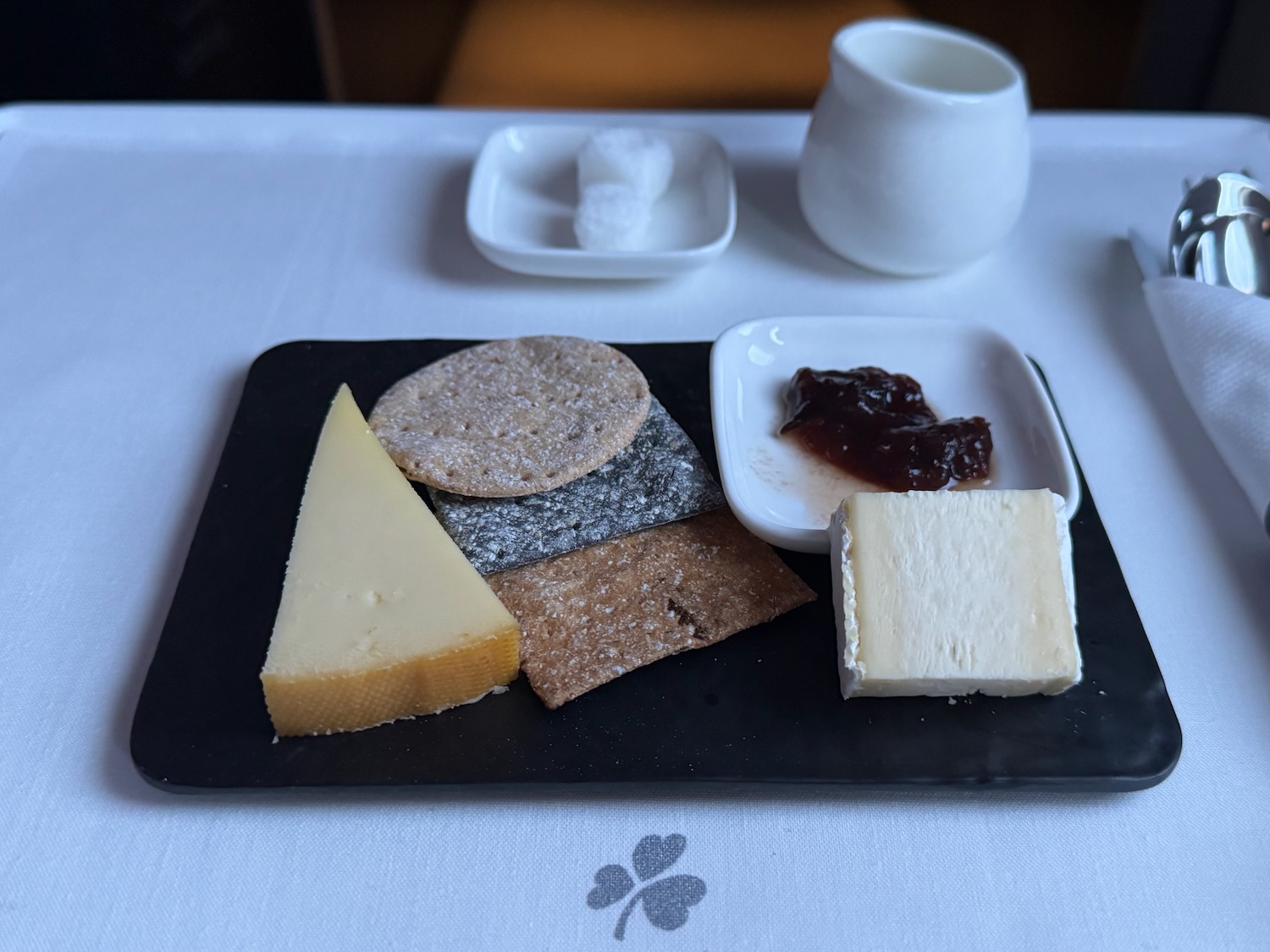 a plate of cheese and crackers