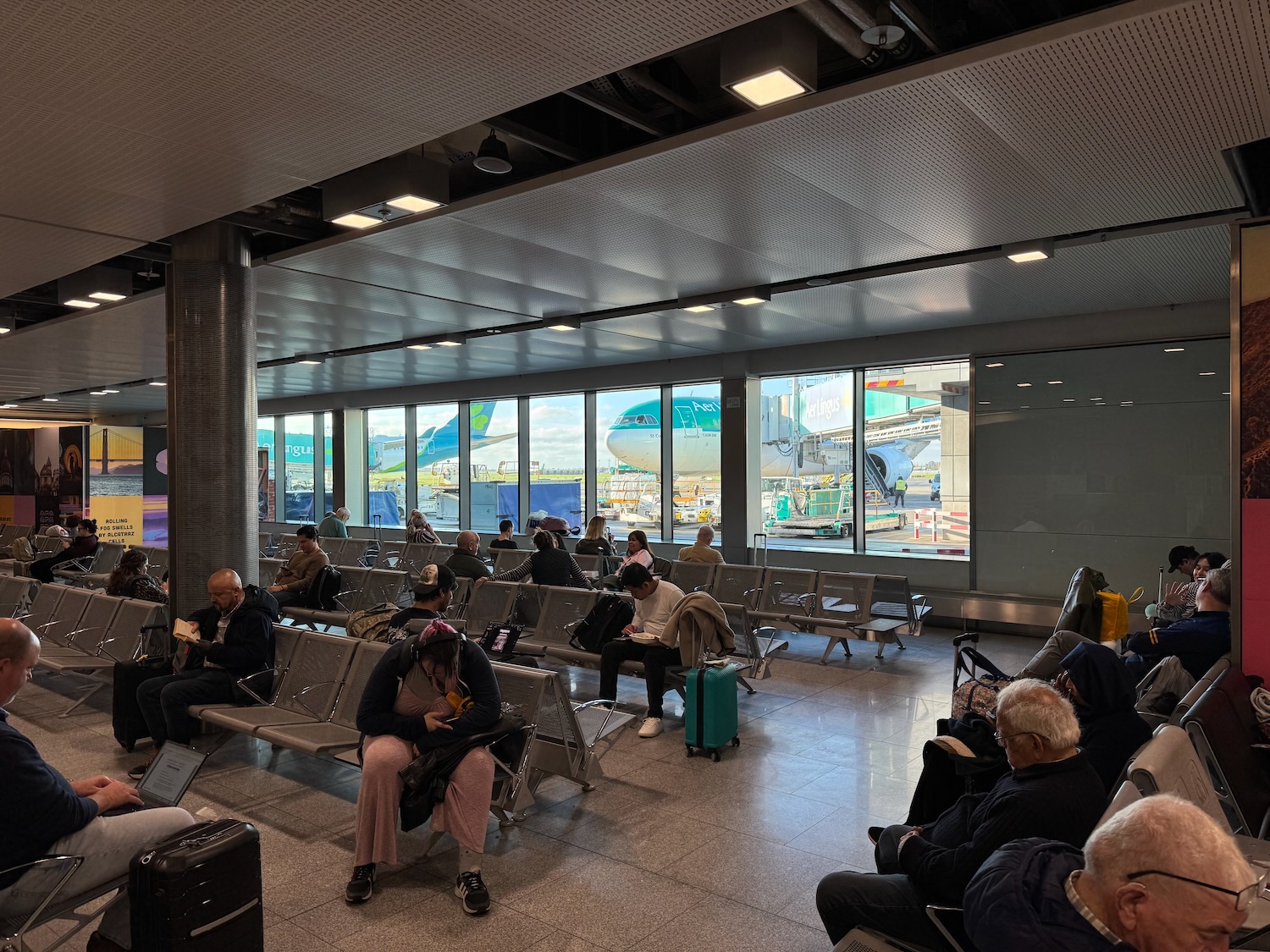 a group of people sitting in a waiting room