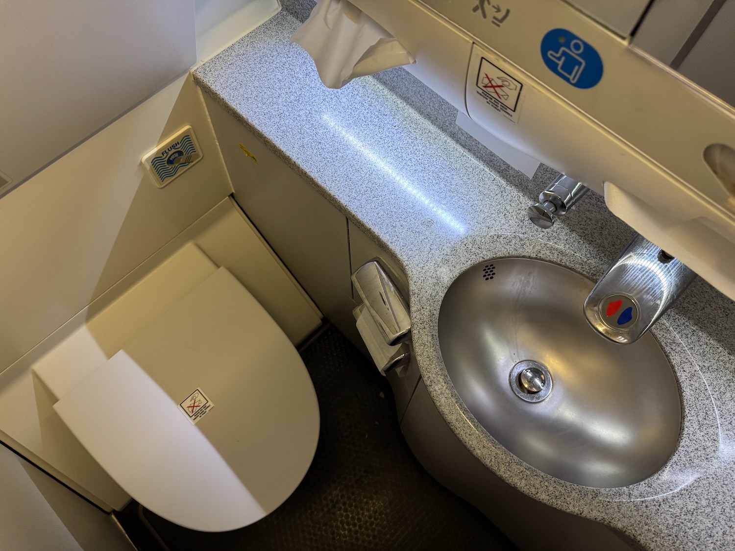 a sink and toilet in a bathroom